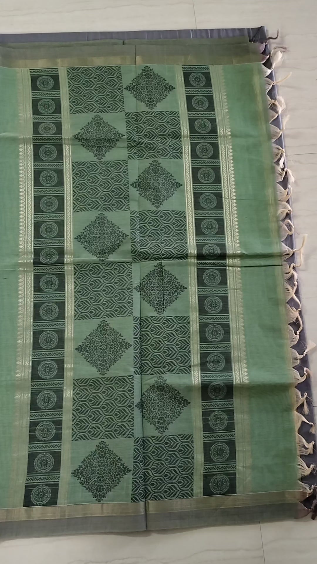 Green cotton saree with golden zari vertical lines & buttas