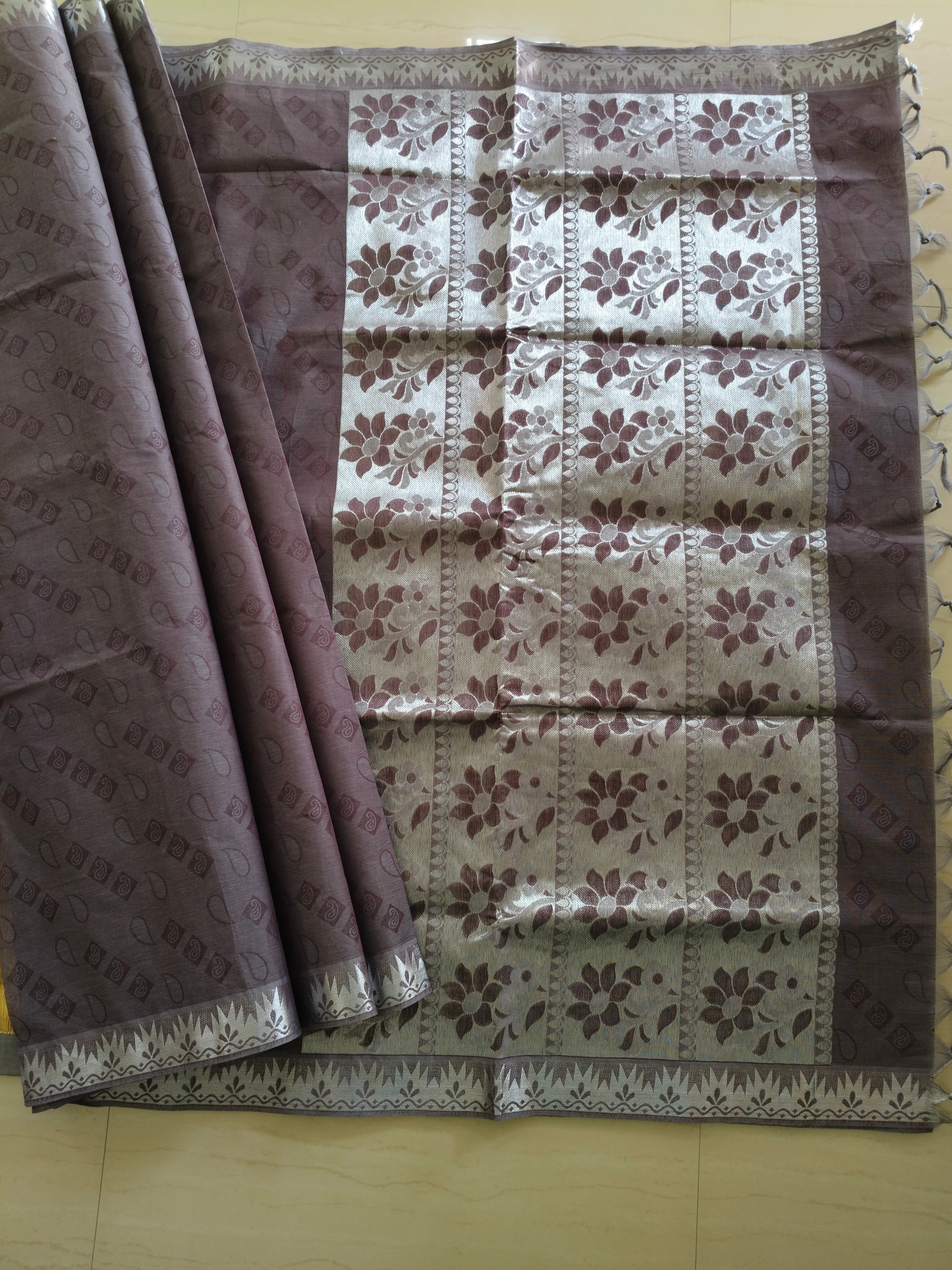 Chocolate brown embossed cotton saree with silver border and silver pallu