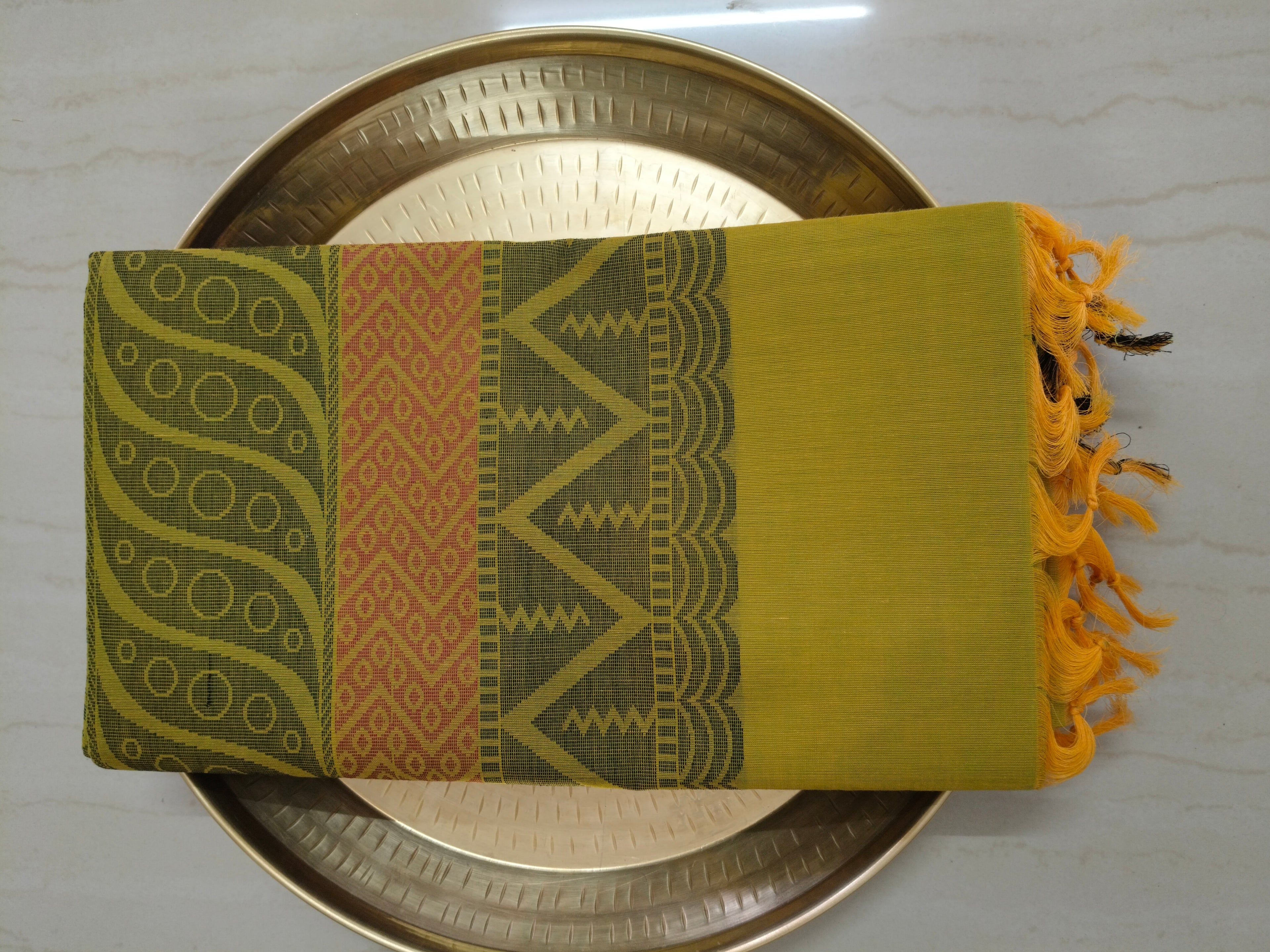 Mehandi green cotton saree with kolam buttas