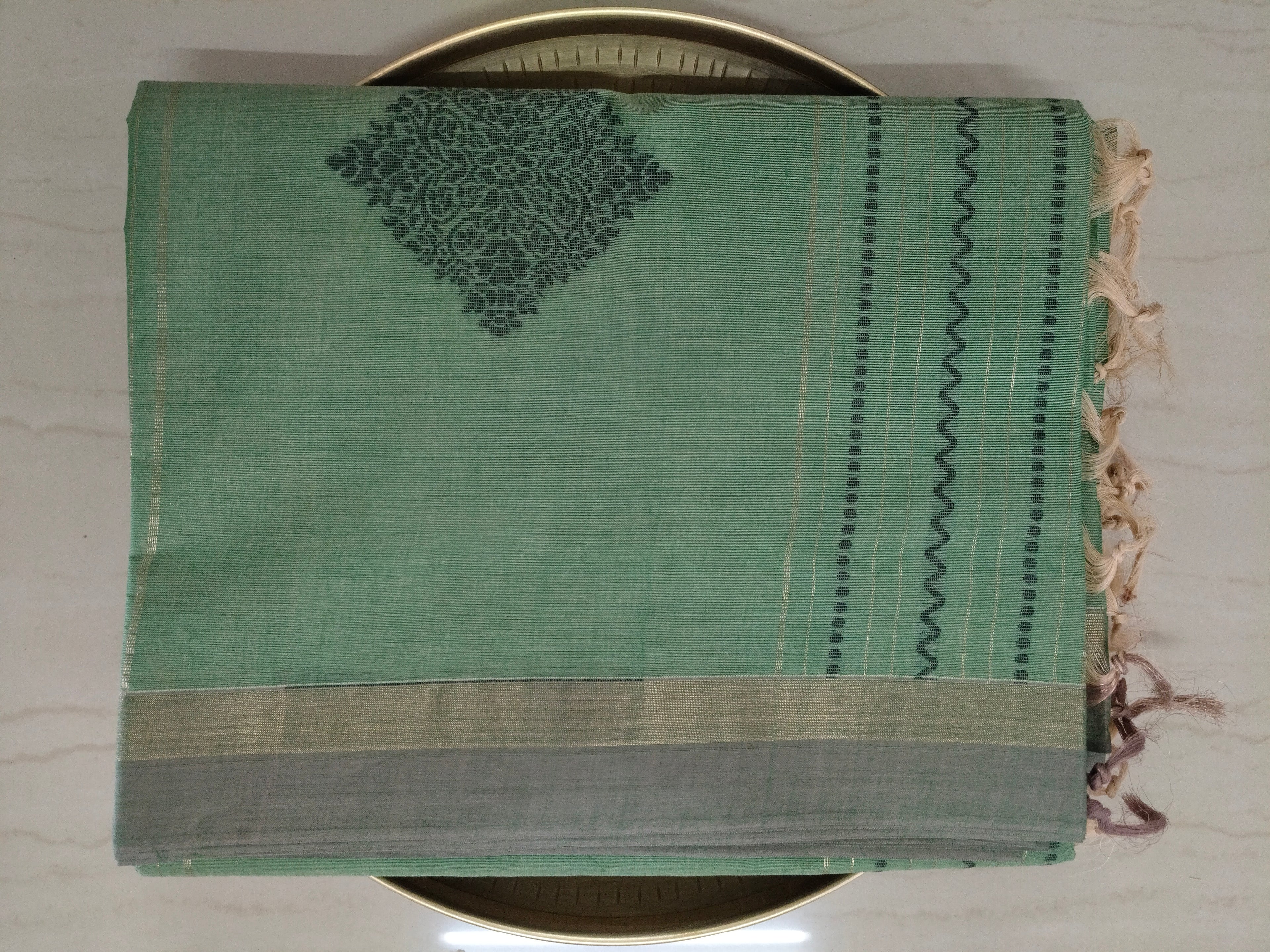 Green cotton saree with golden zari vertical lines & buttas