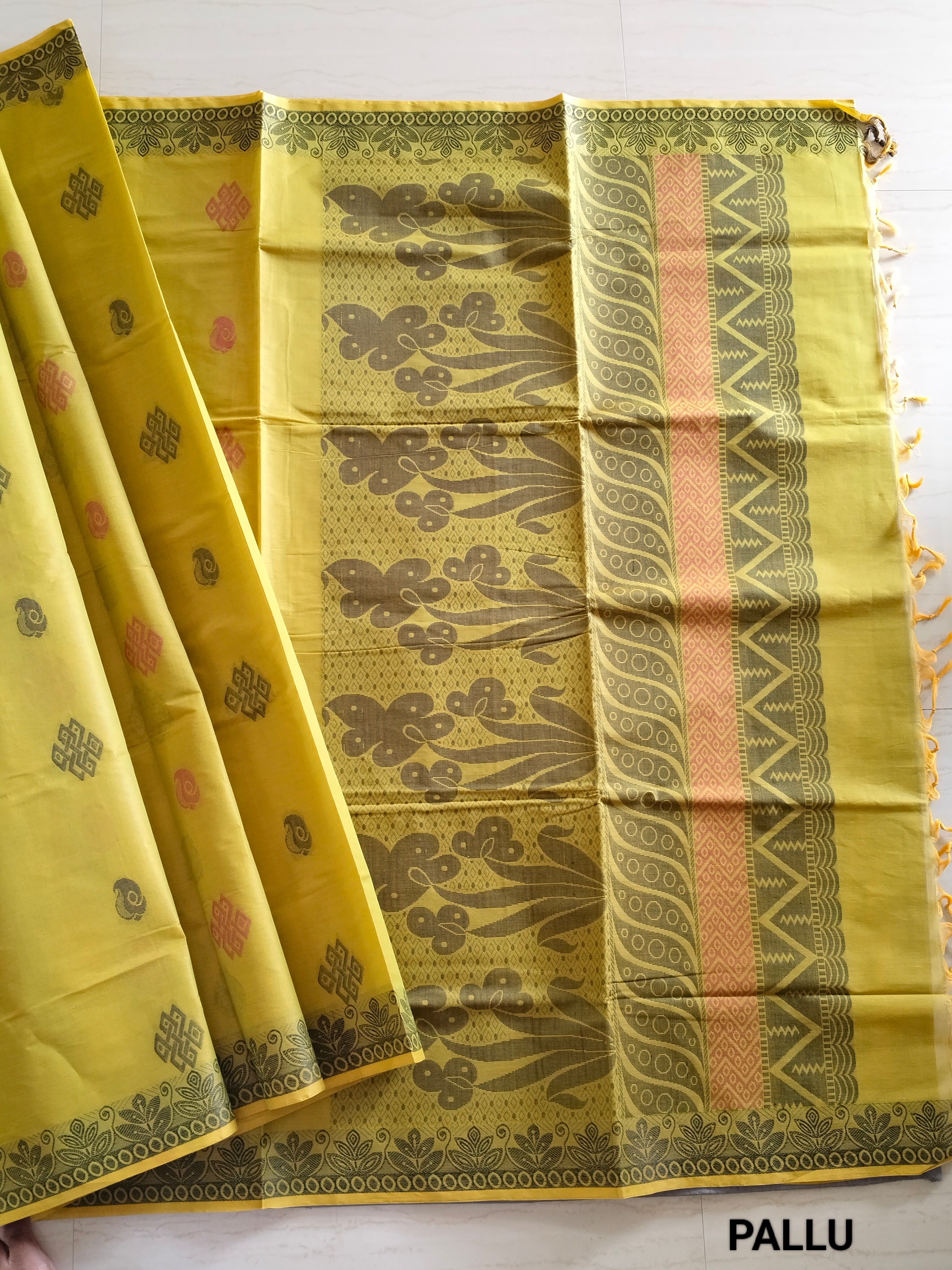Mehandi green cotton saree with kolam buttas