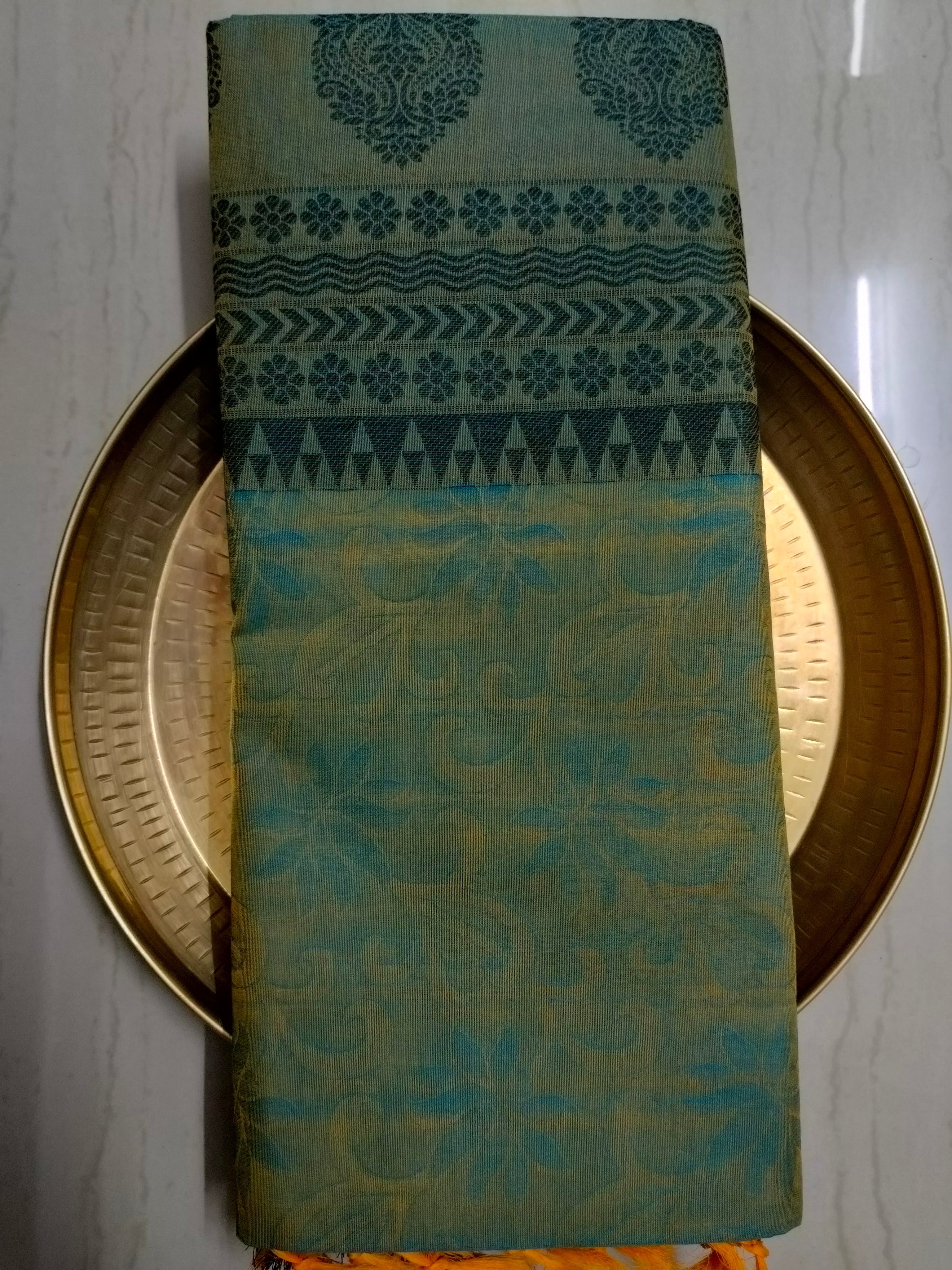 Green embossed cotton saree