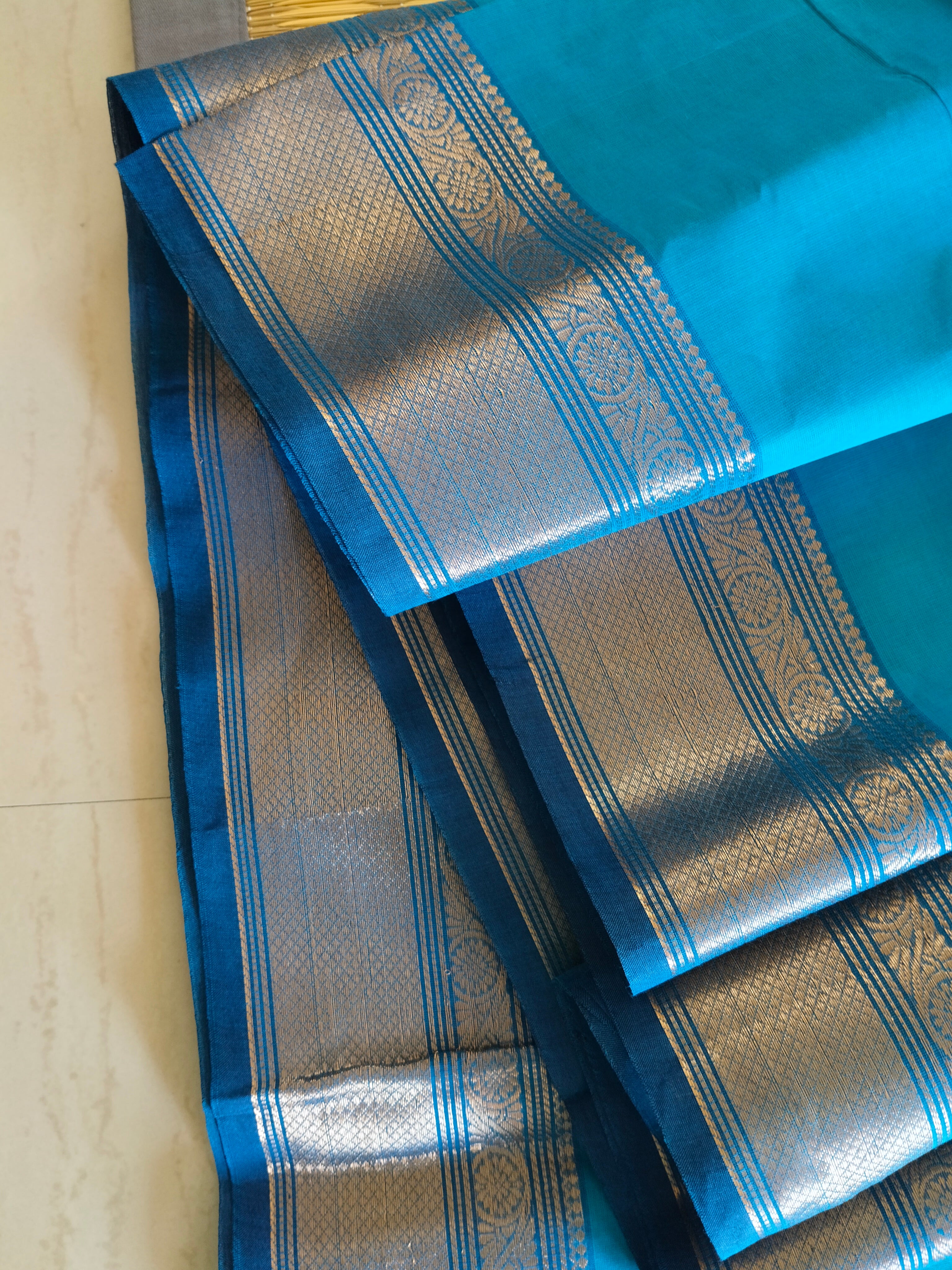 Blue chettinad cotton saree with Mango buttas and zari border