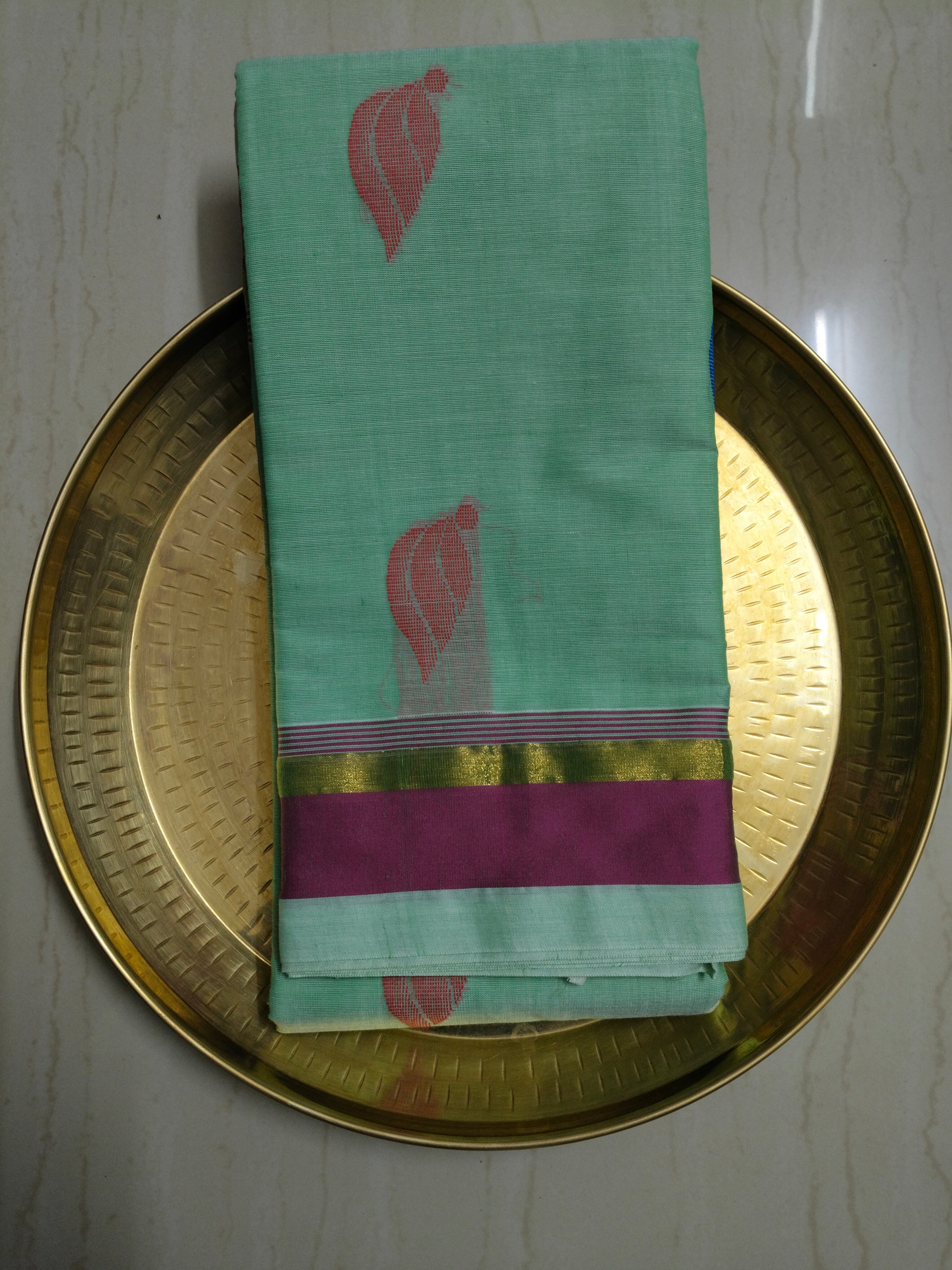 Tea green cotton saree with flower buttas