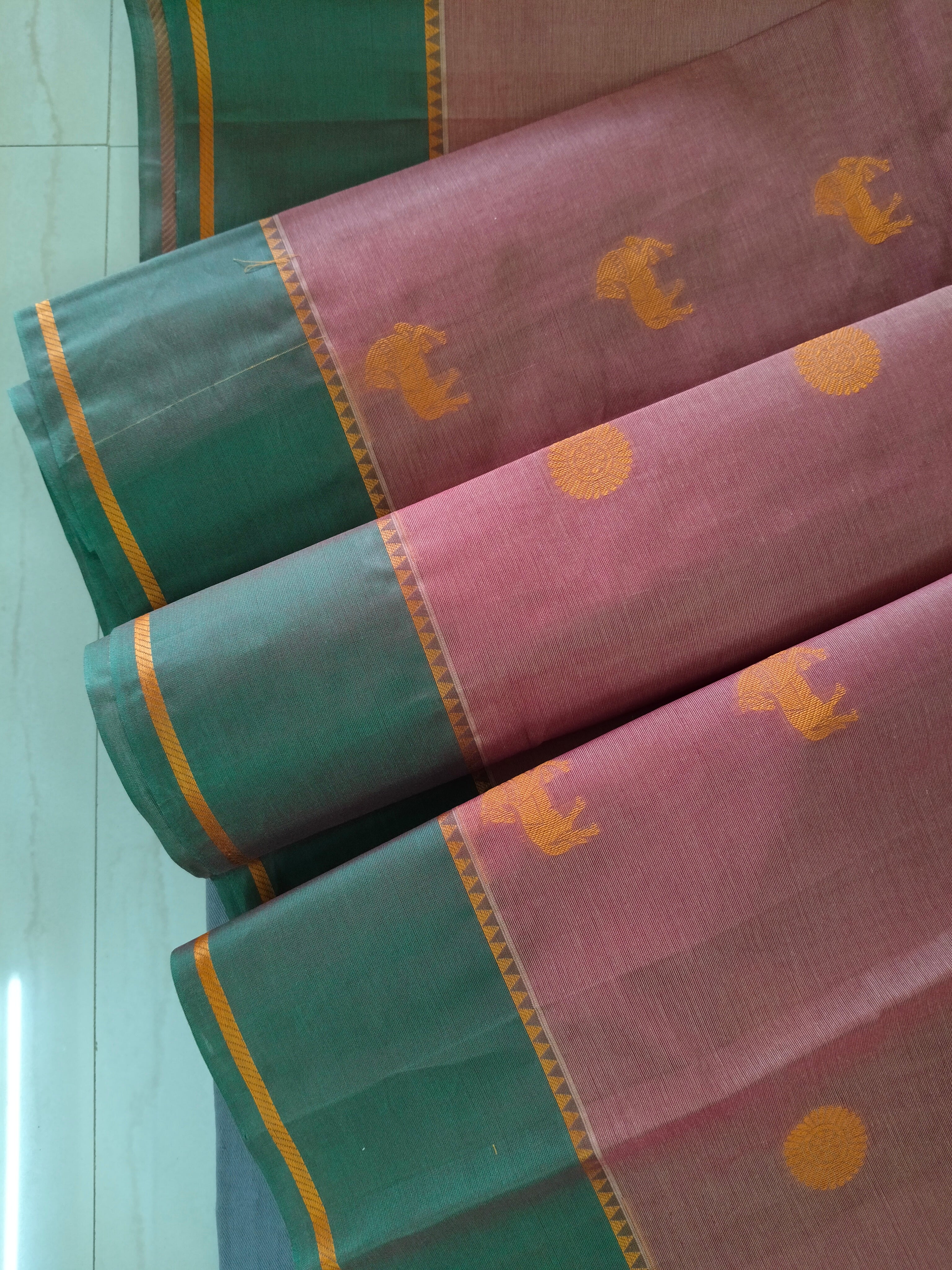 Deep Salmon cotton saree with horse & rudhrasham and ganga jamuna border