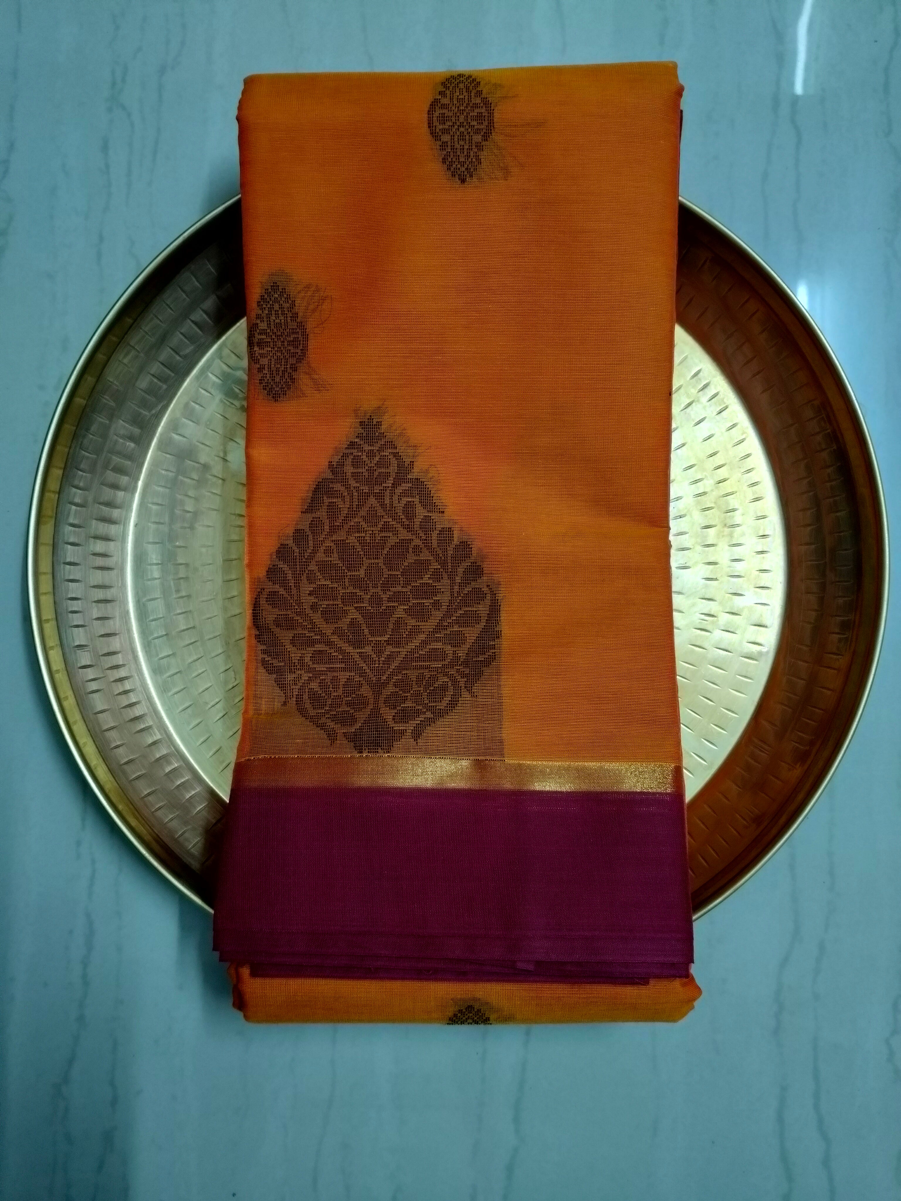 Pumpkin Orange cotton saree with black buttas