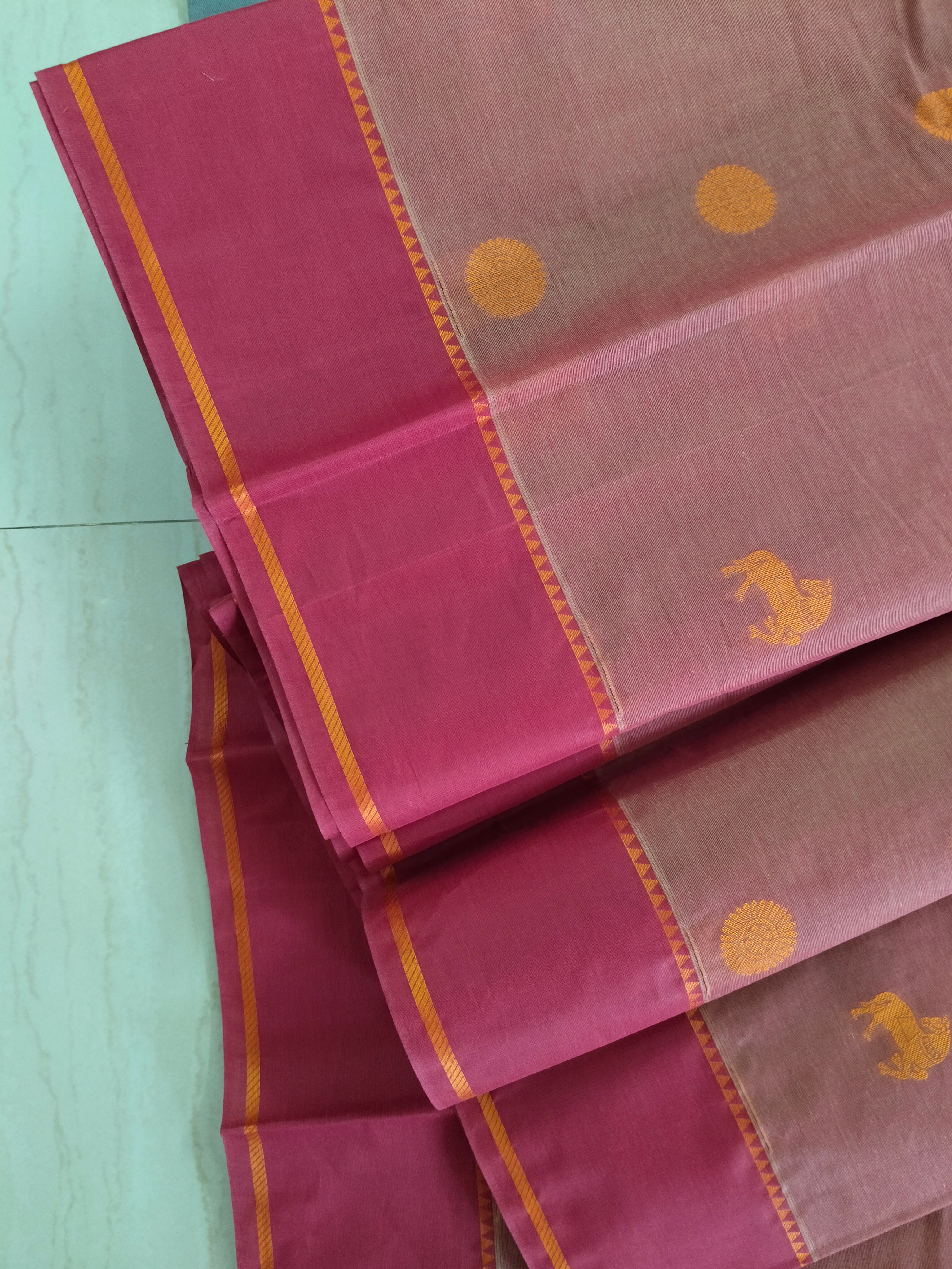 Deep Salmon cotton saree with horse & rudhrasham and ganga jamuna border
