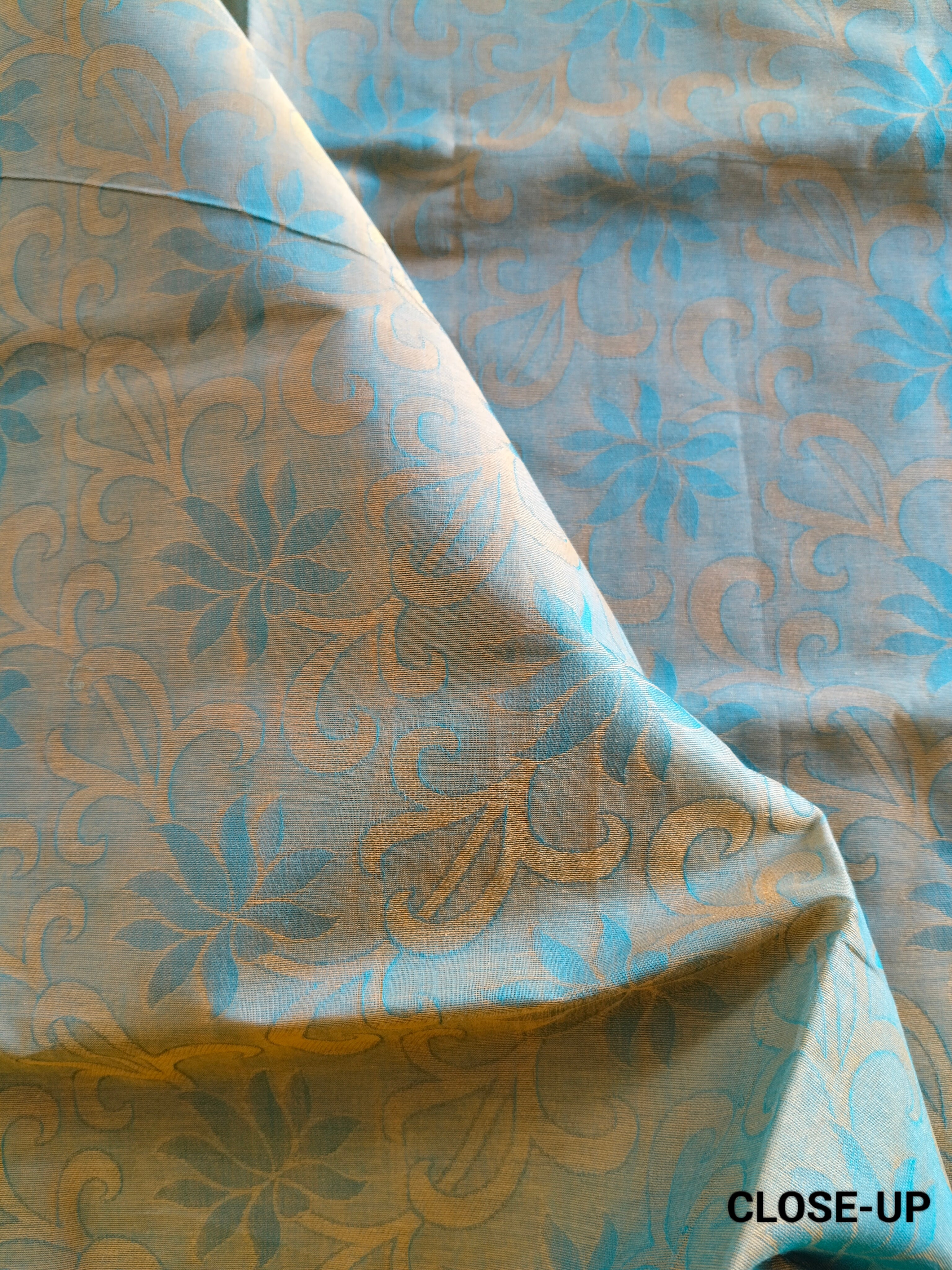 Green embossed cotton saree