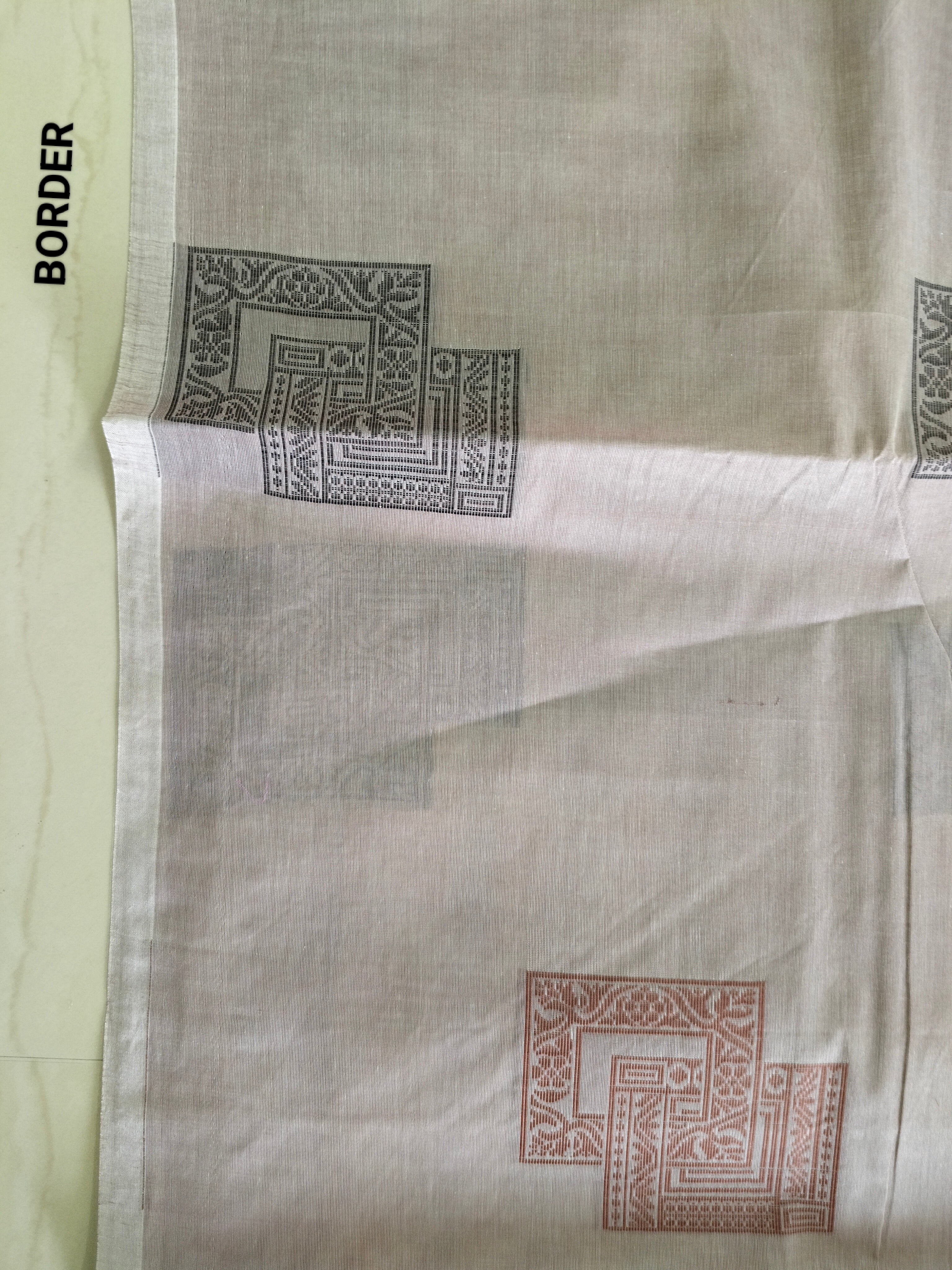 Almond pink cotton saree with square buttas