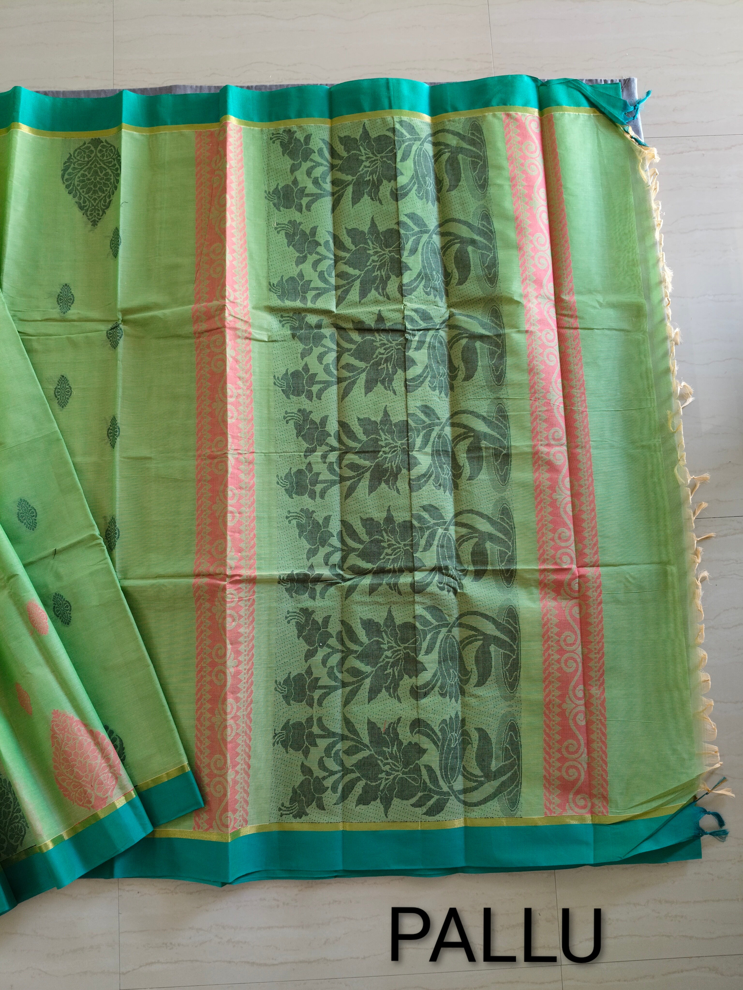 Light green dual tone cotton saree with thread buttas