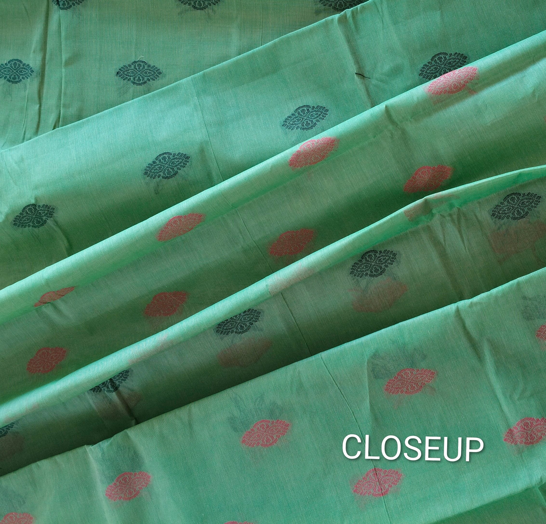 Light green dual tone cotton saree with thread buttas