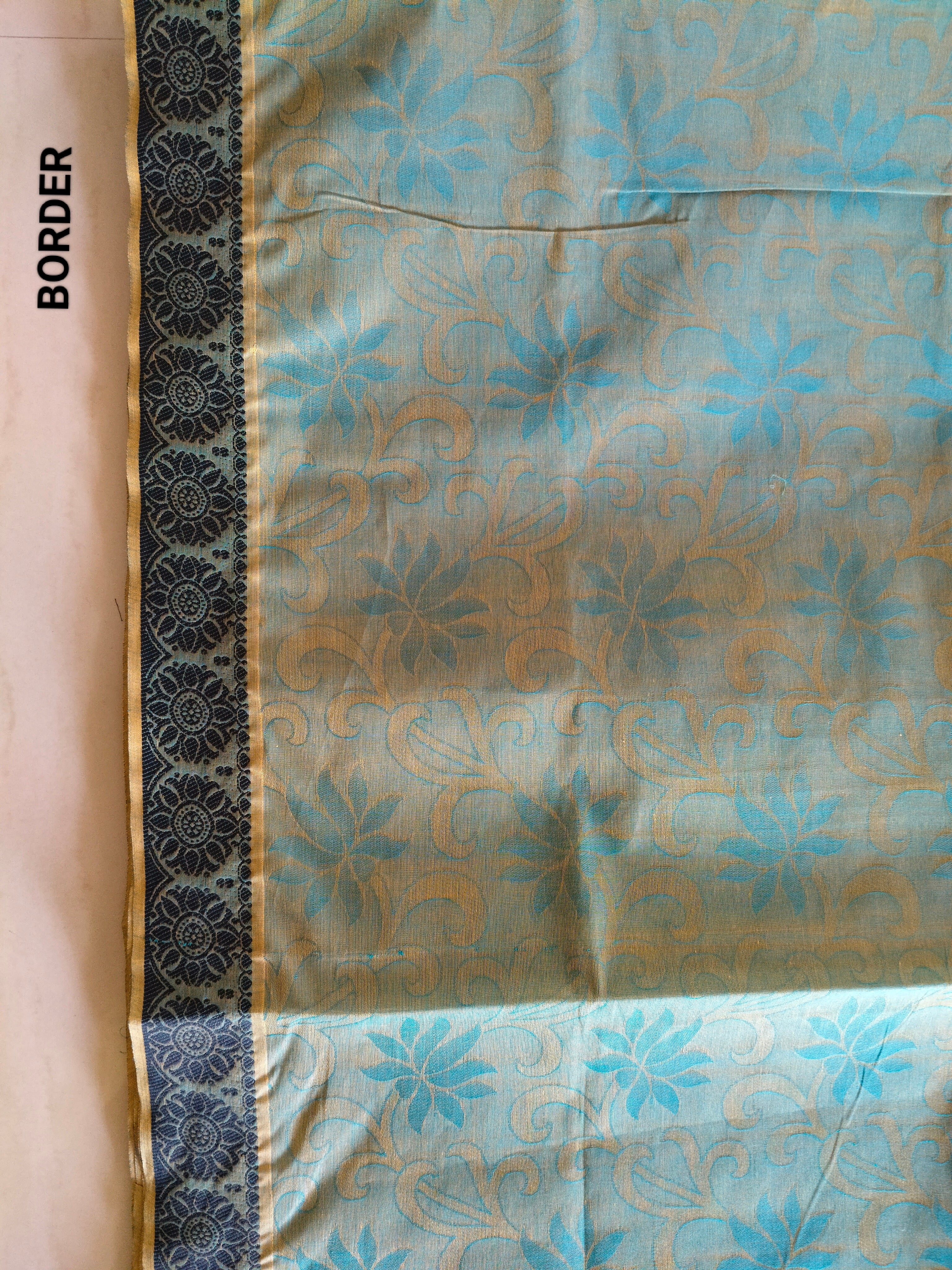 Green embossed cotton saree