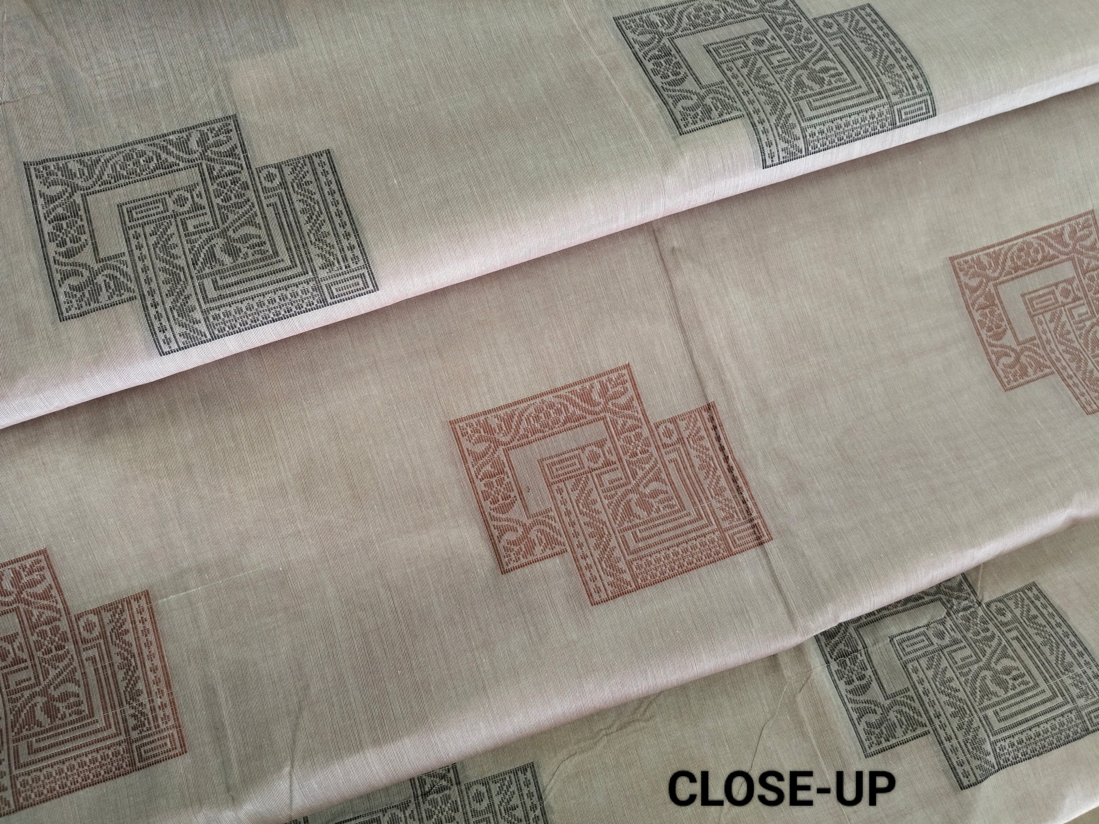 Almond pink cotton saree with square buttas