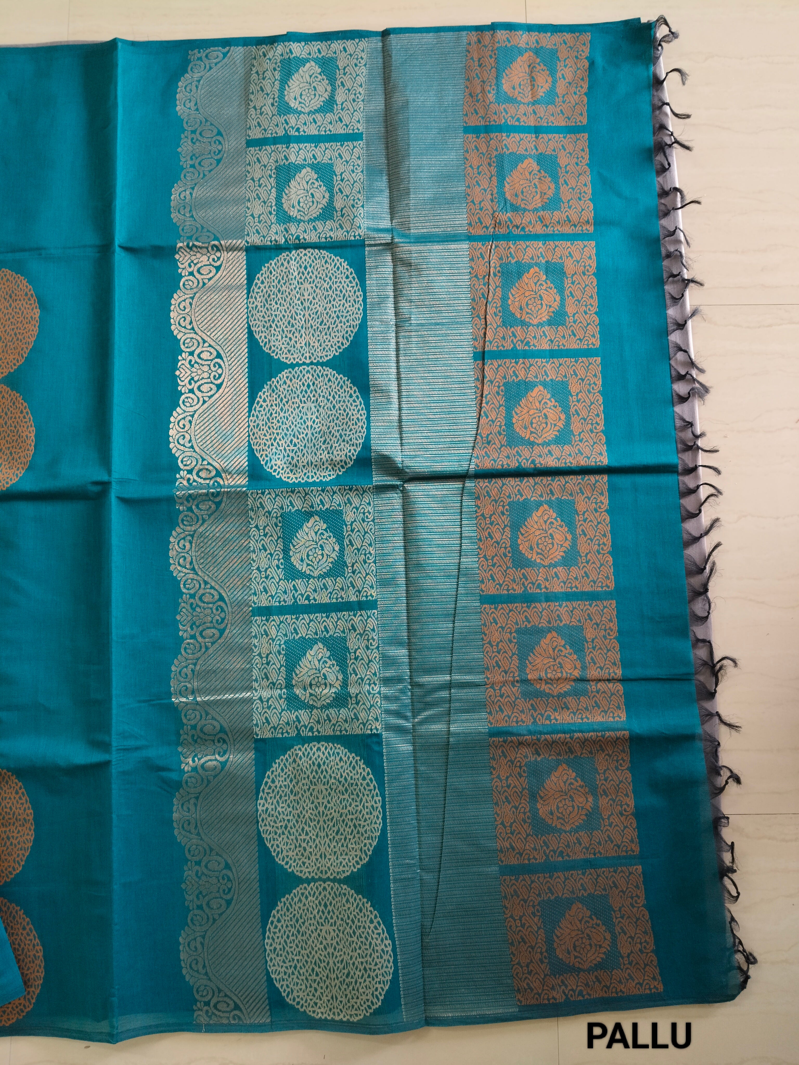 Blue cotton saree with silver & copper zari buttas