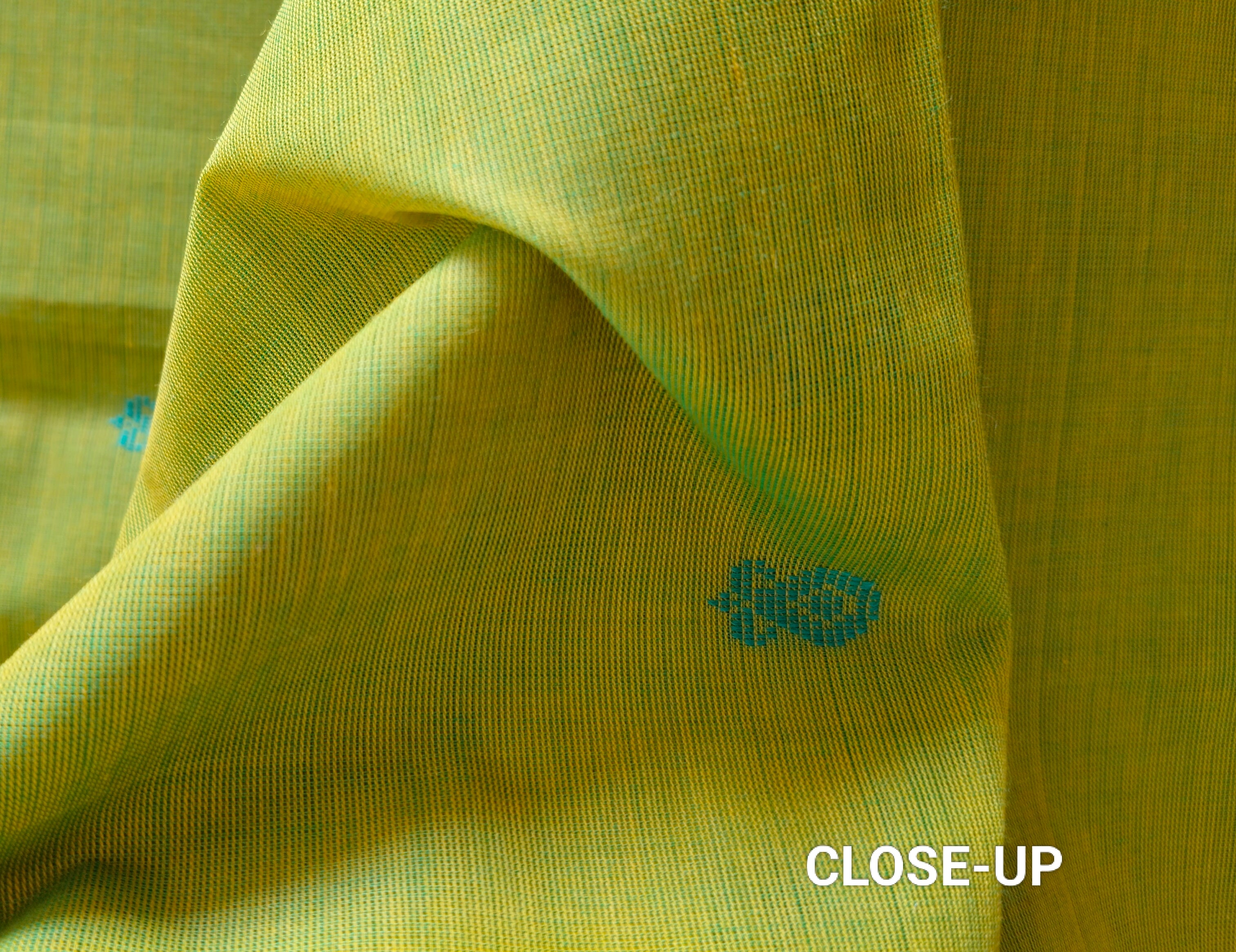 Bright yellow-green cotton saree with buttas all over