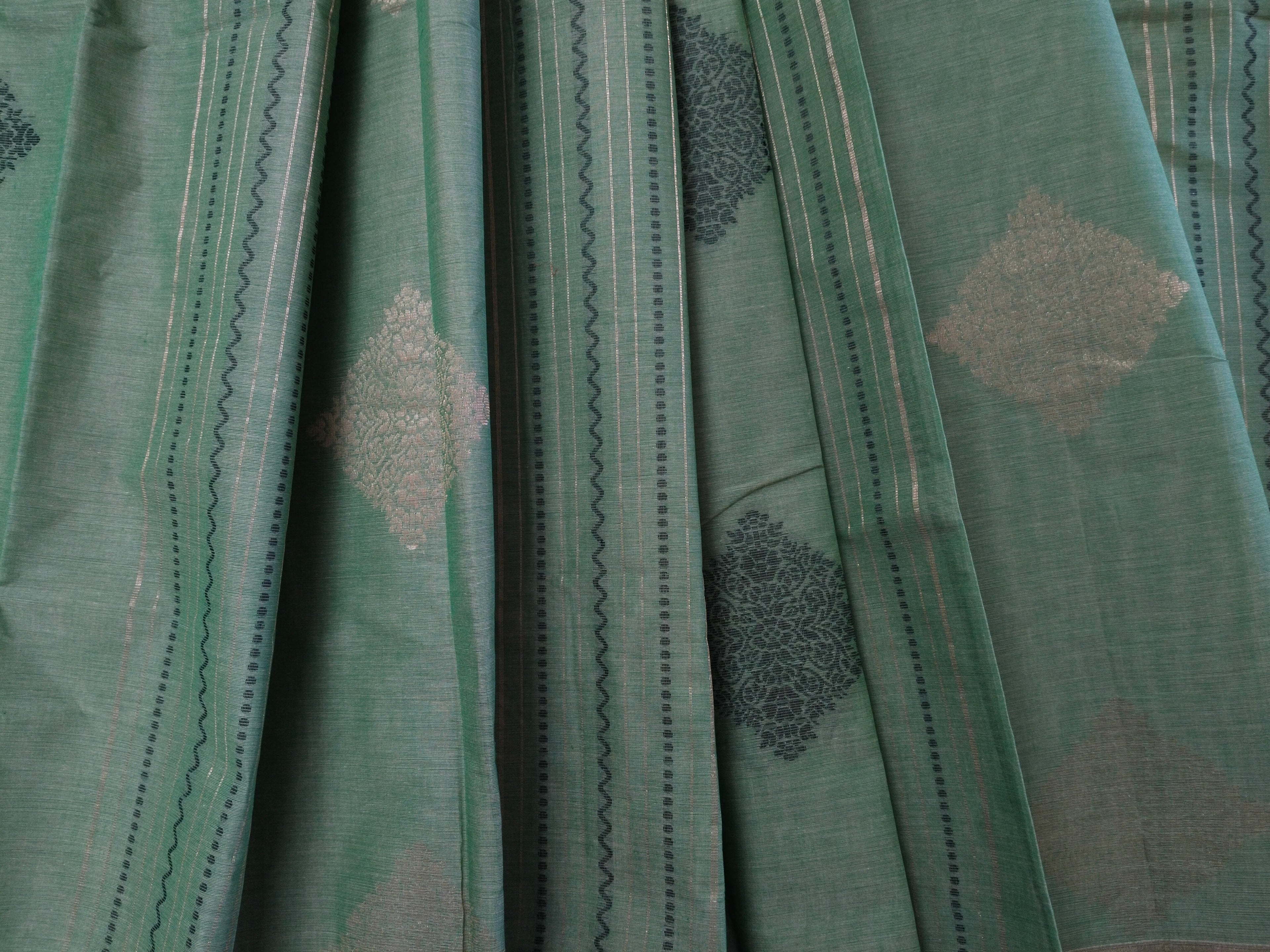 Green cotton saree with golden zari vertical lines & buttas