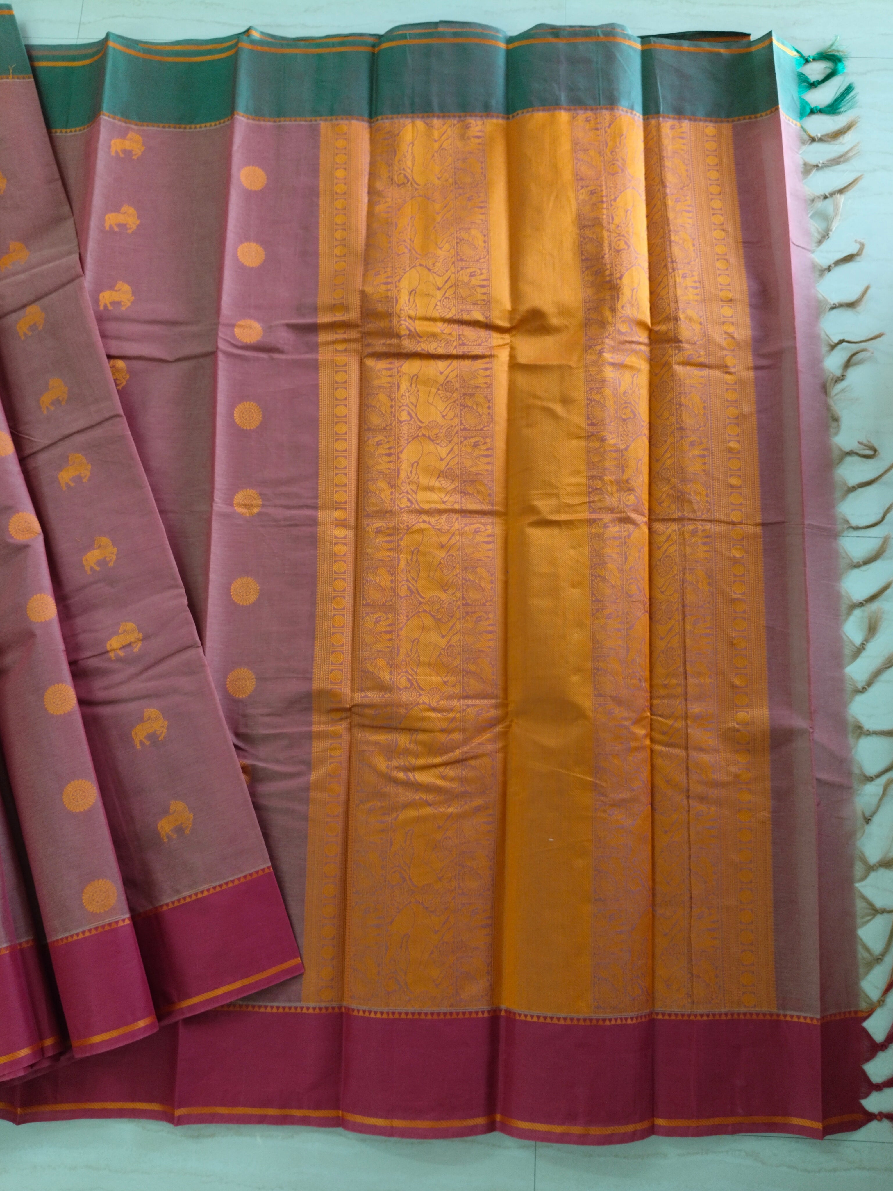 Deep Salmon cotton saree with horse & rudhrasham and ganga jamuna border