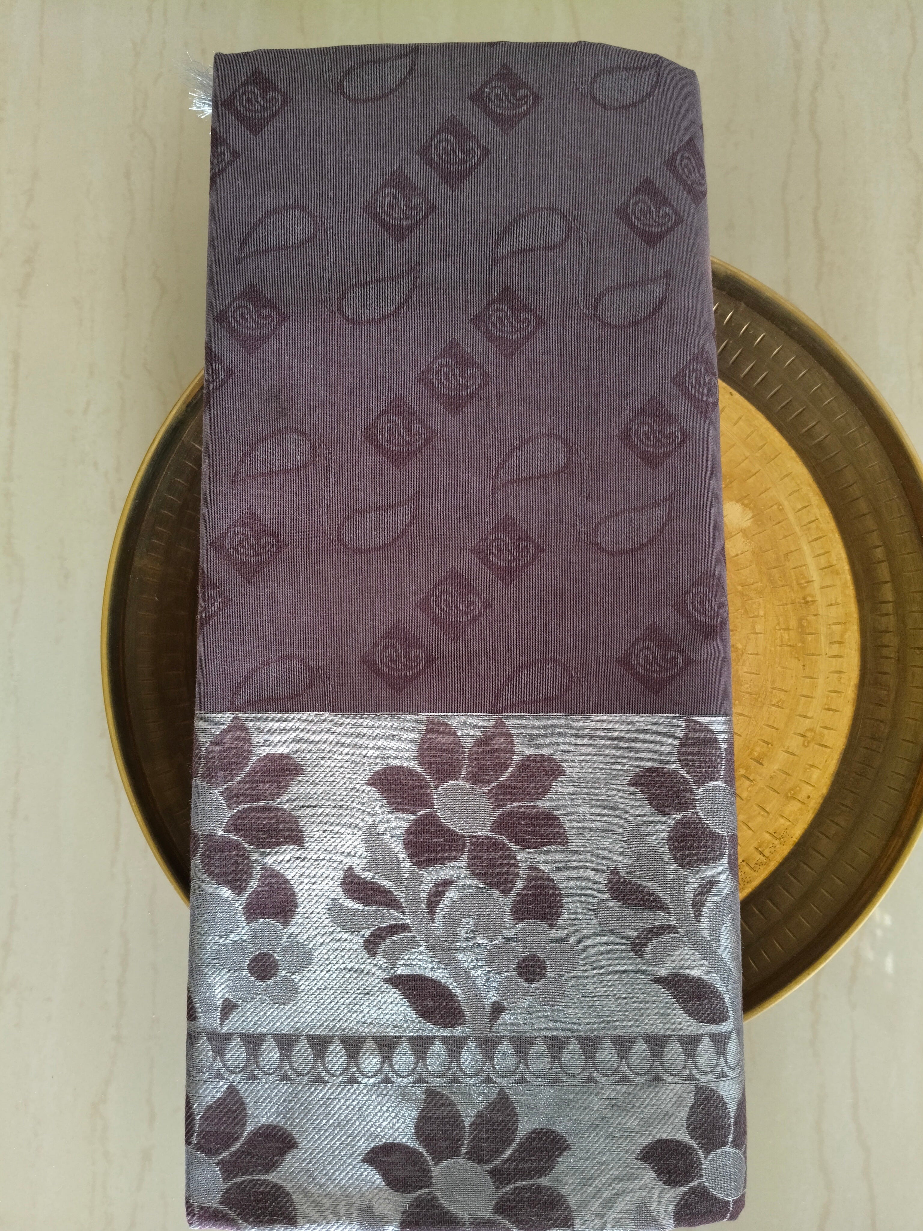 Chocolate brown embossed cotton saree with silver border and silver pallu