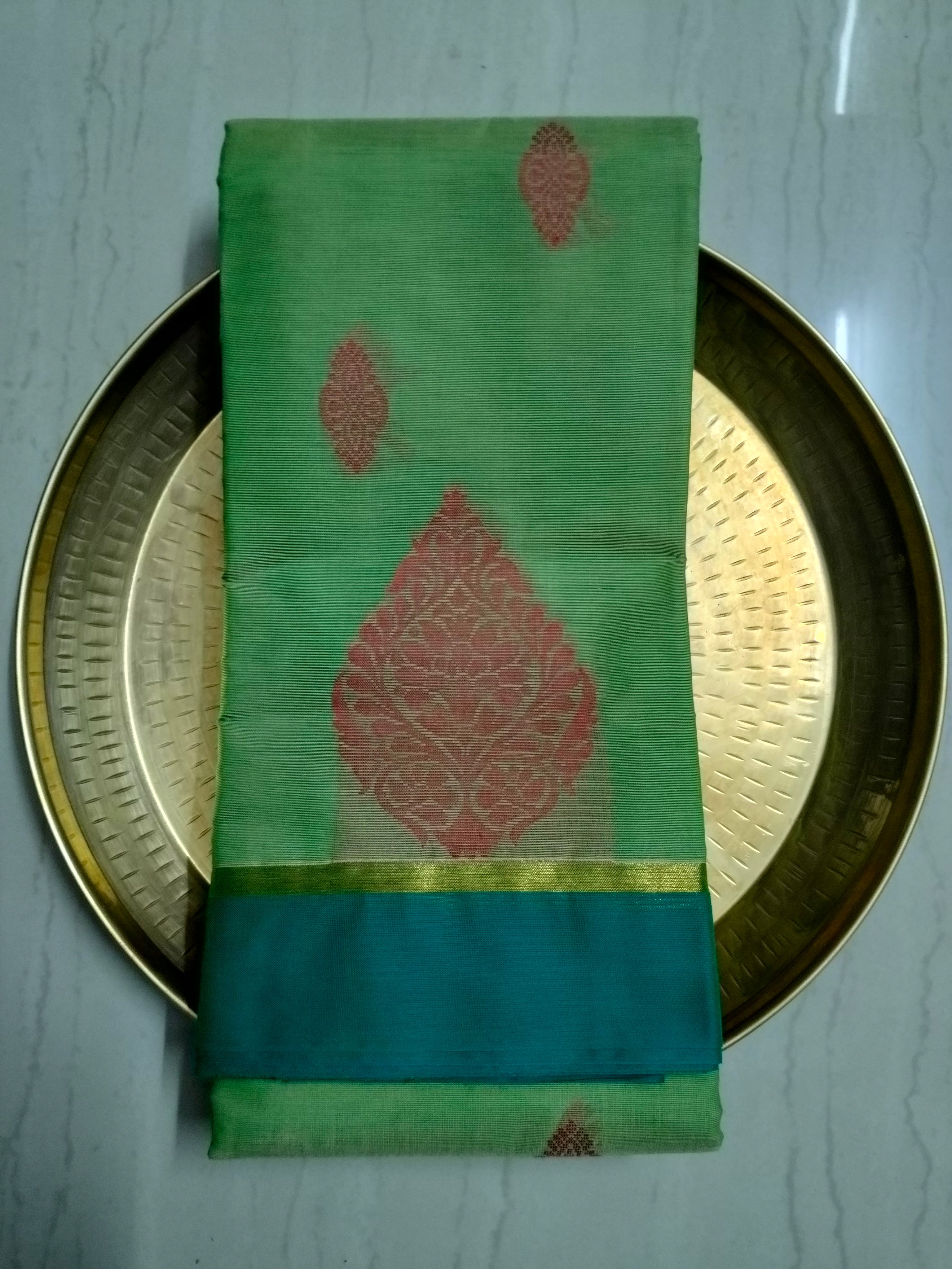 Light green dual tone cotton saree with thread buttas