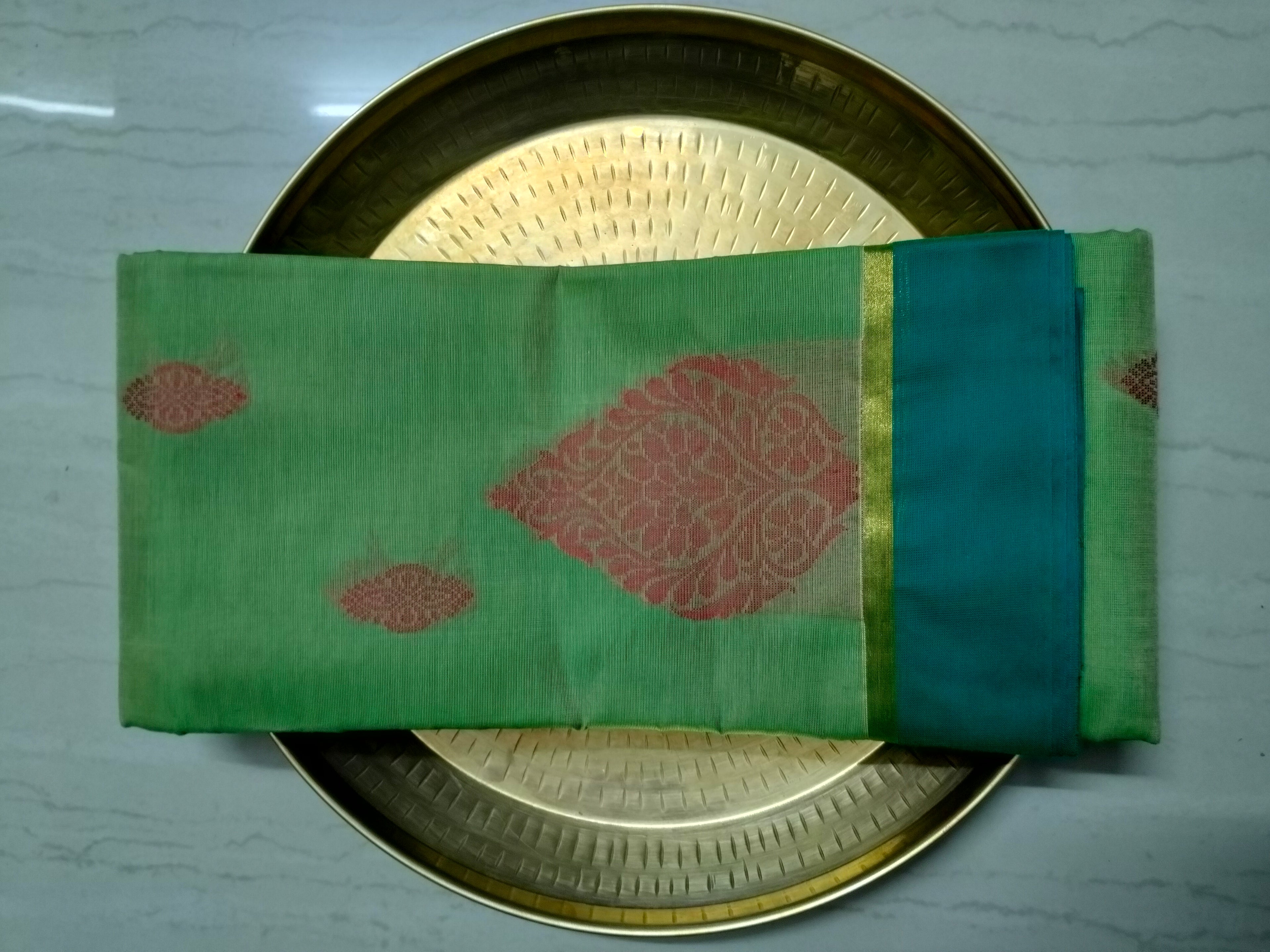 Light green dual tone cotton saree with thread buttas