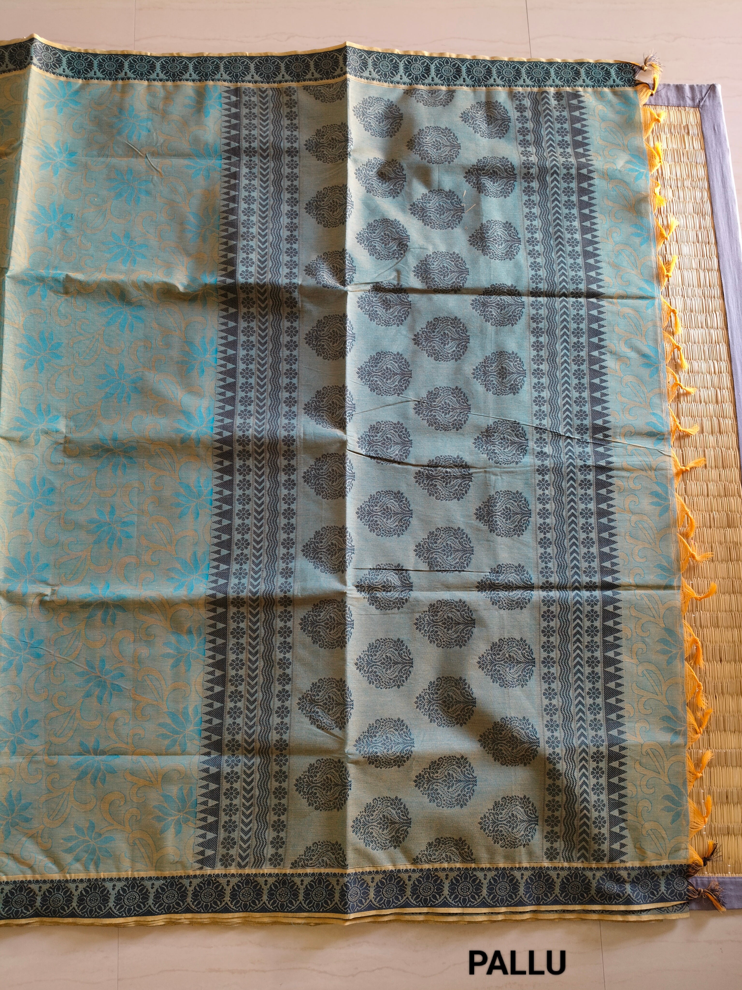 Green embossed cotton saree