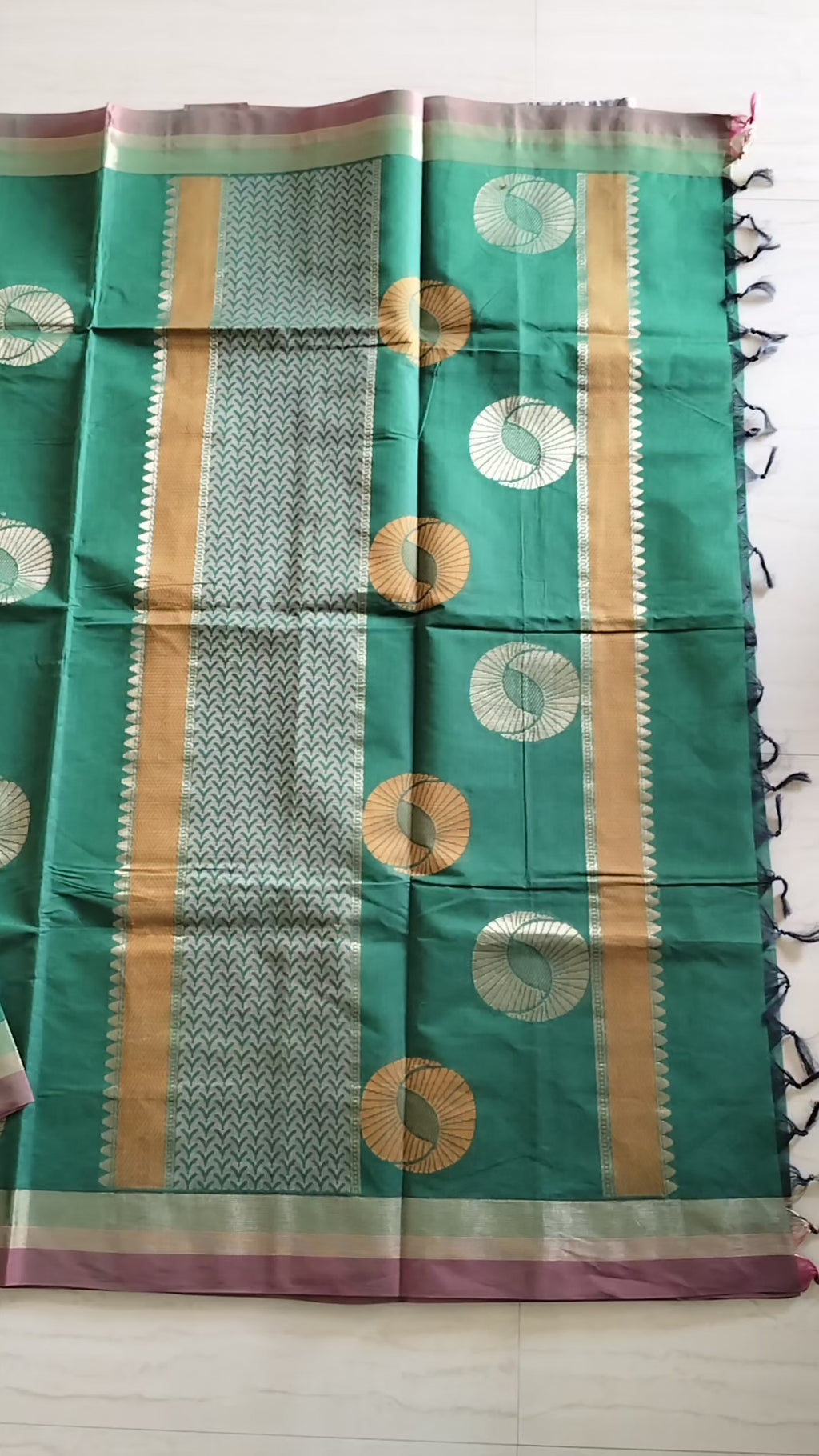 Cotton saree with golden zari & orange buttas.