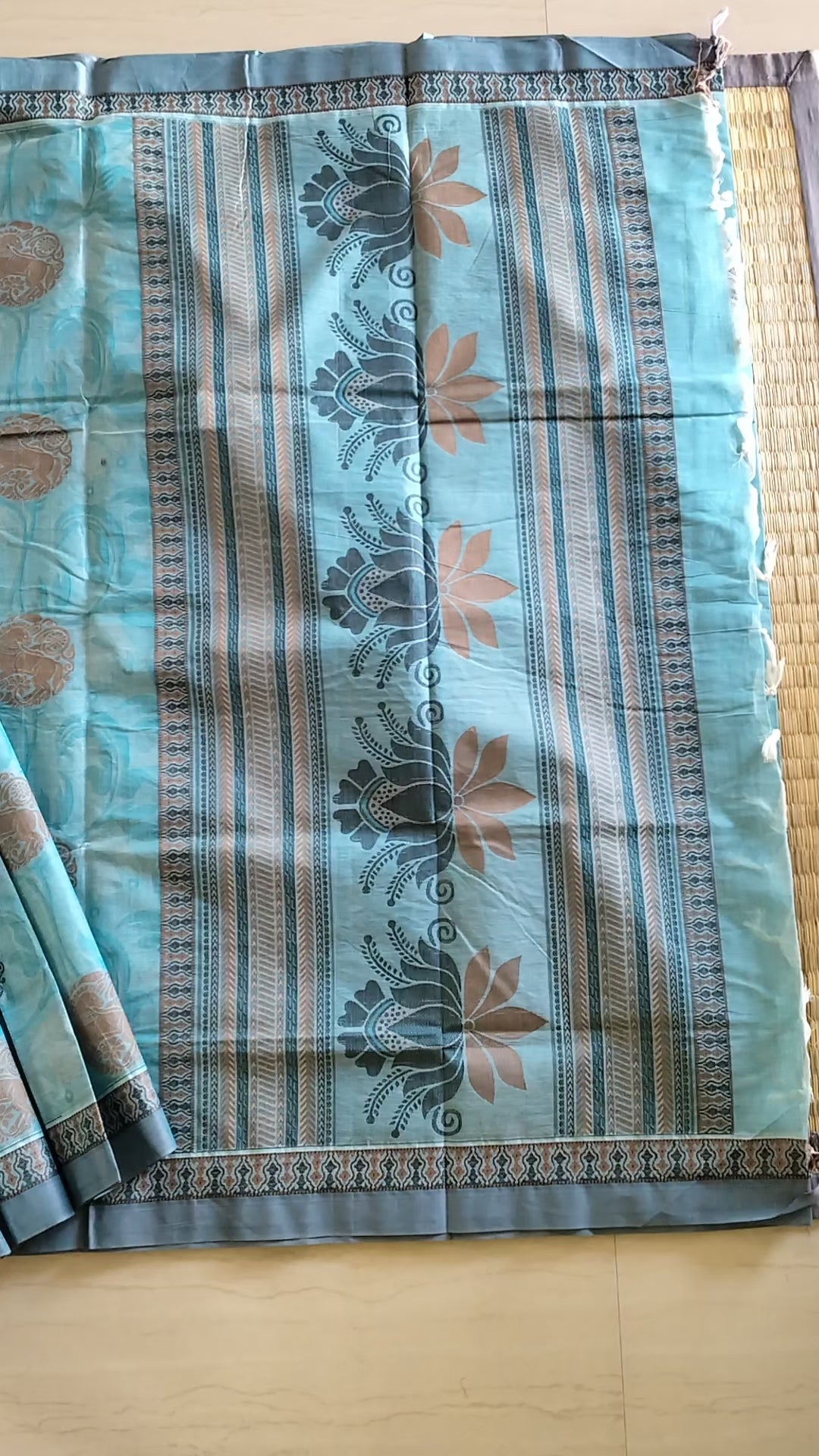 Blue embossed cotton saree with horse butta thread work