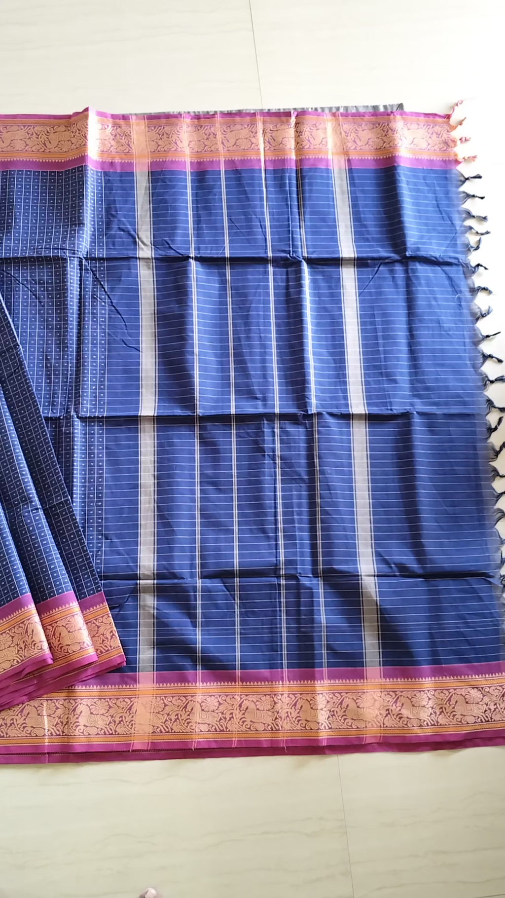Blue Lakshadeepam saree with pink embroidered border