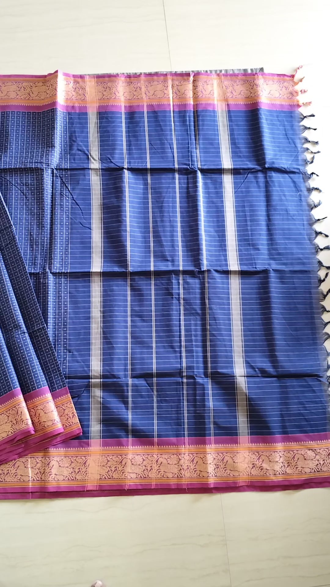 Blue Lakshadeepam saree with pink embroidered border