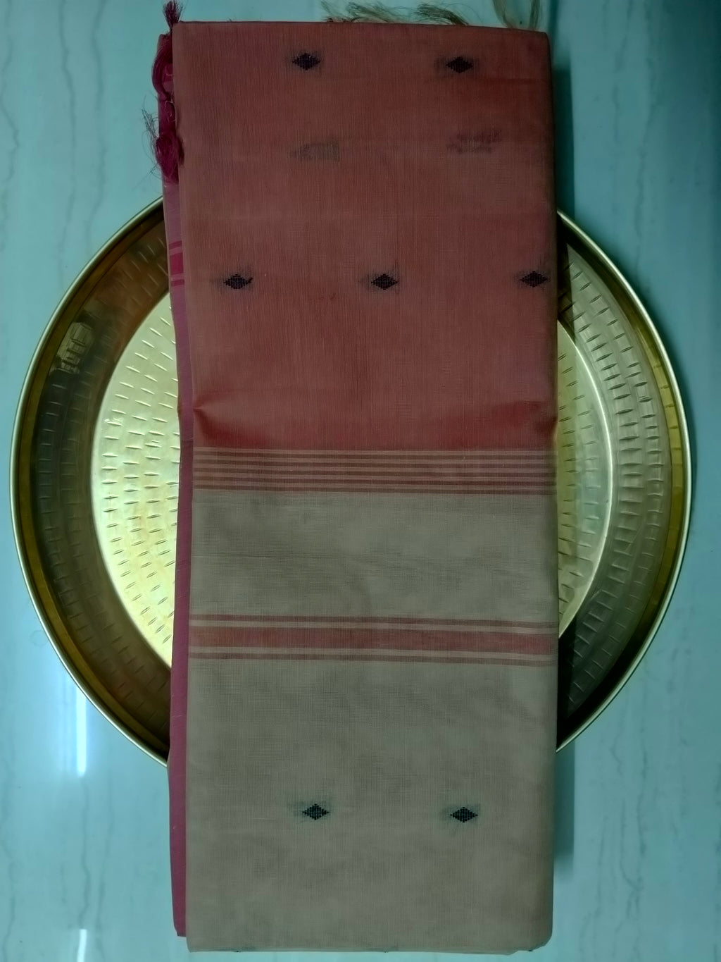 Tart orange cotton saree with beige pallu