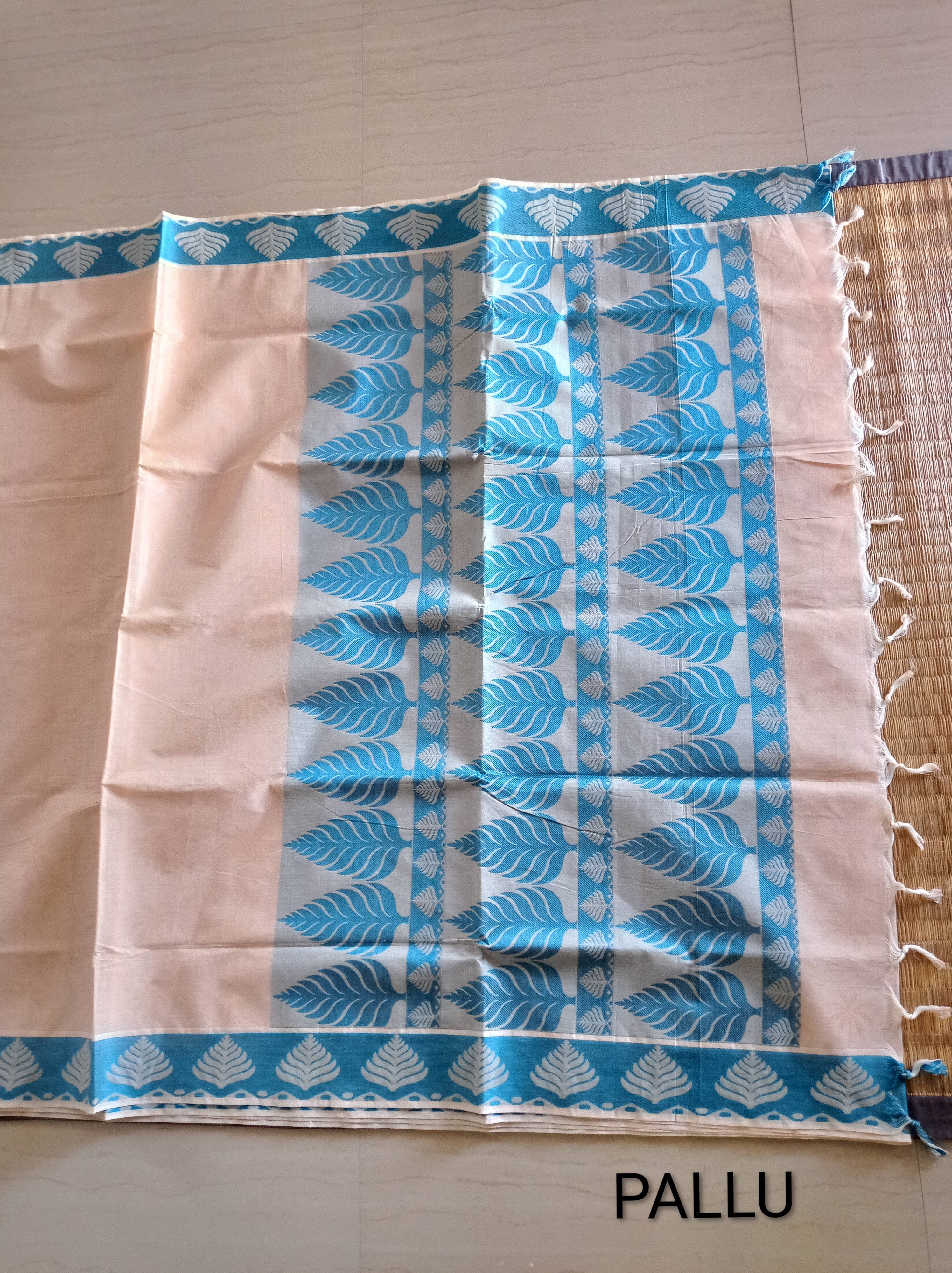 Pastel cream embossed cotton saree with blue thread work