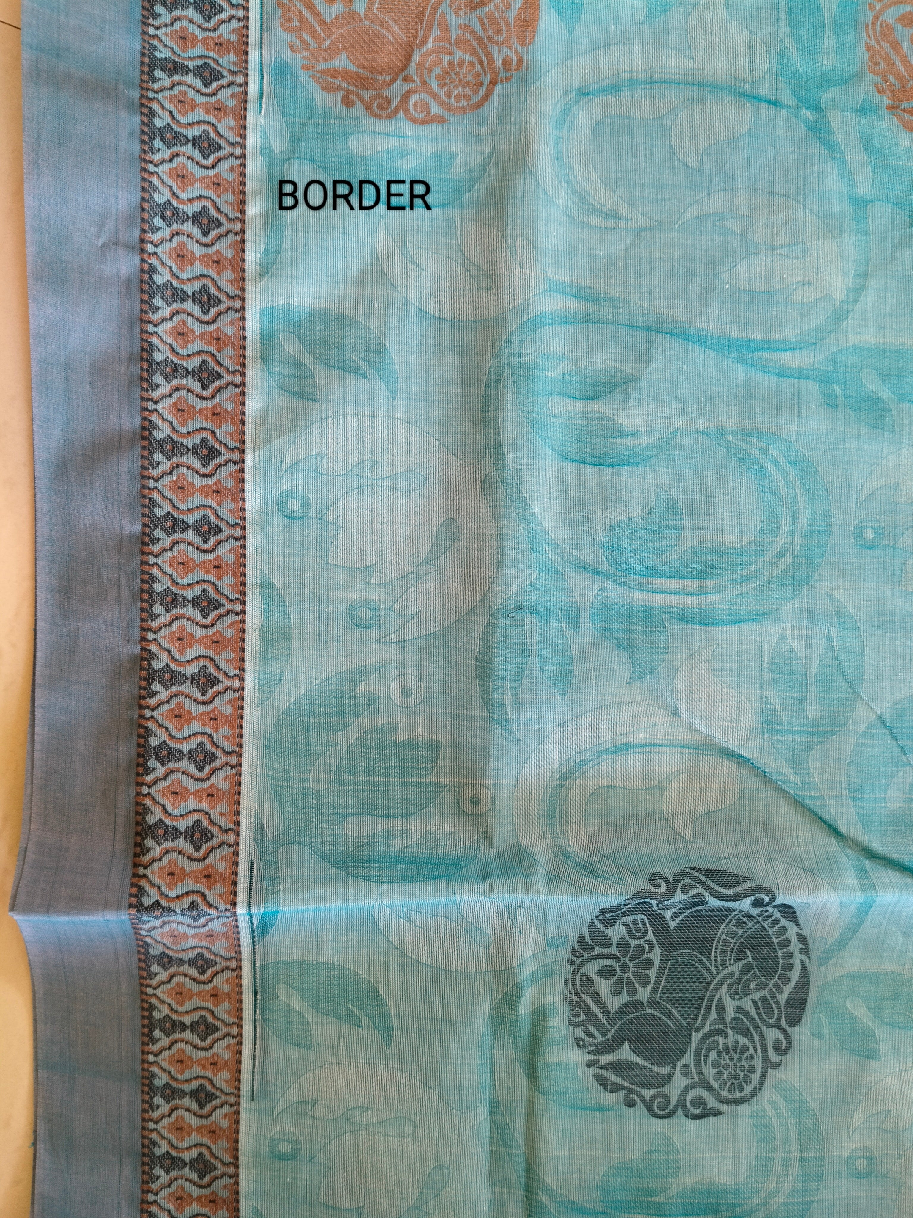 Blue embossed cotton saree with horse butta thread work