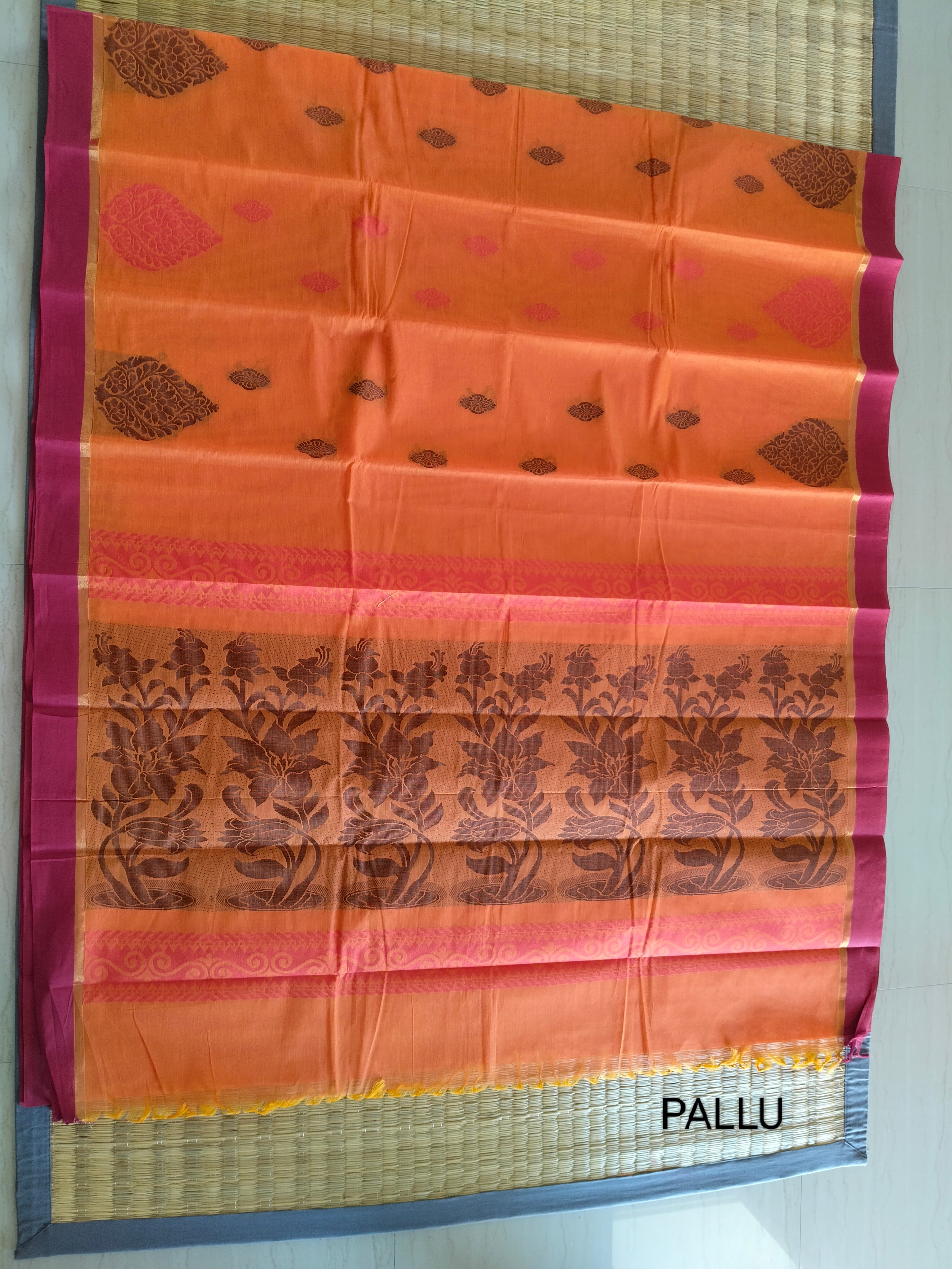 Pumpkin Orange cotton saree with black buttas