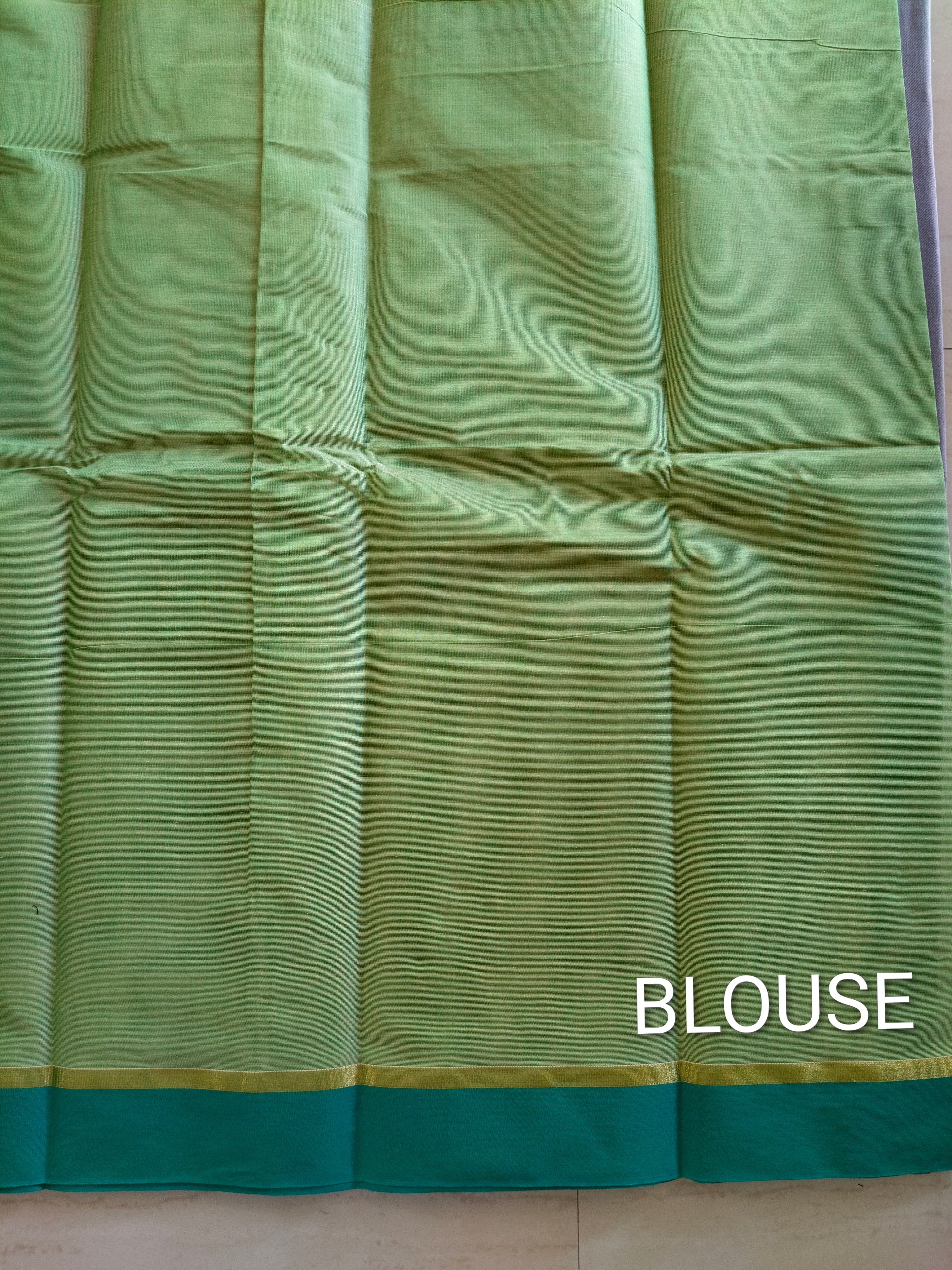 Light green dual tone cotton saree with thread buttas