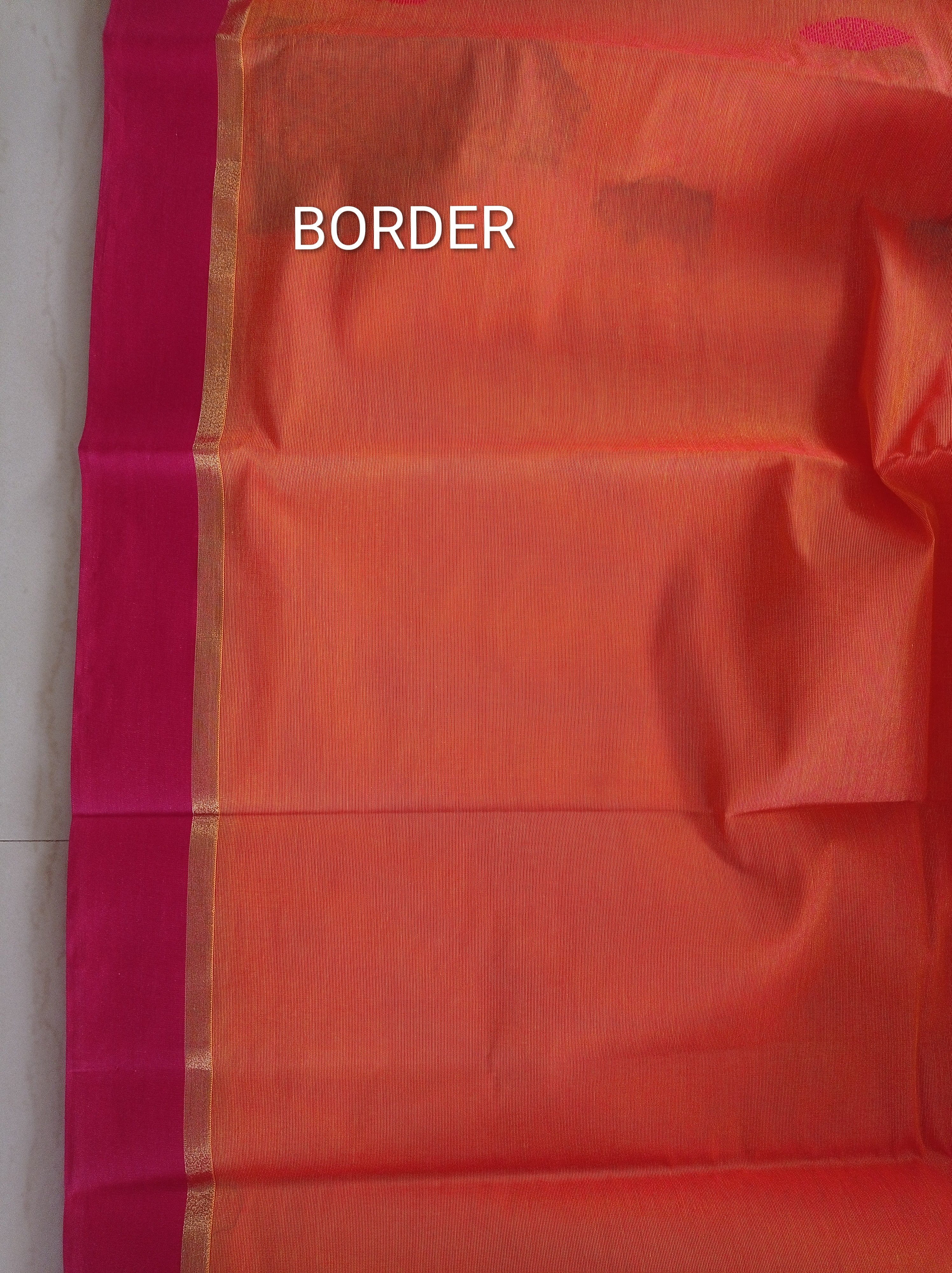 Pumpkin Orange cotton saree with black buttas