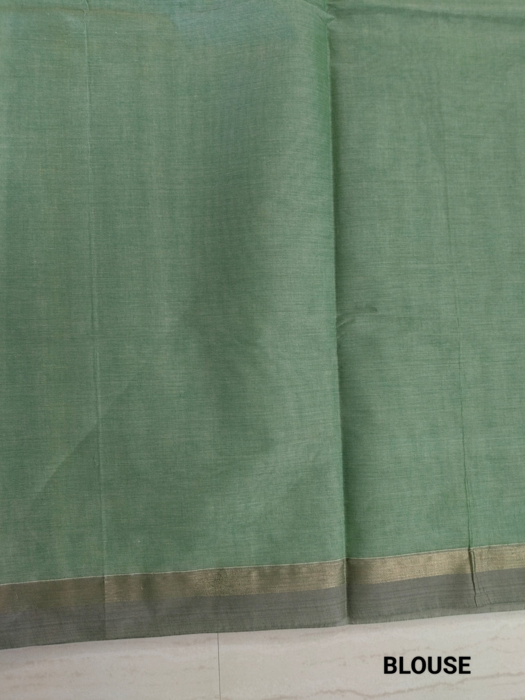 Green cotton saree with golden zari vertical lines & buttas
