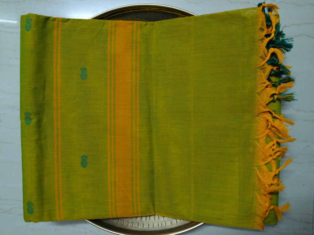 Bright yellow-green cotton saree with buttas all over