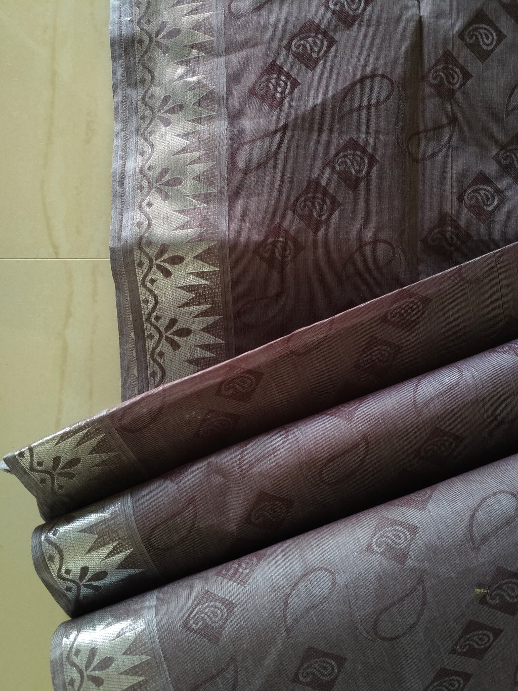 Chocolate brown embossed cotton saree with silver border and silver pallu