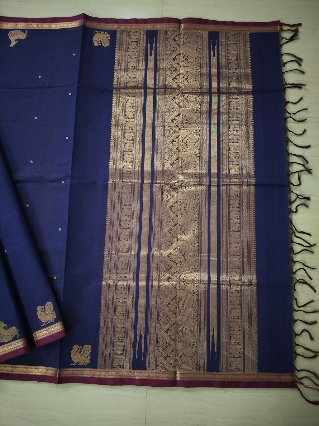 Blue golden zari cotton saree with small buttas & grand pallu