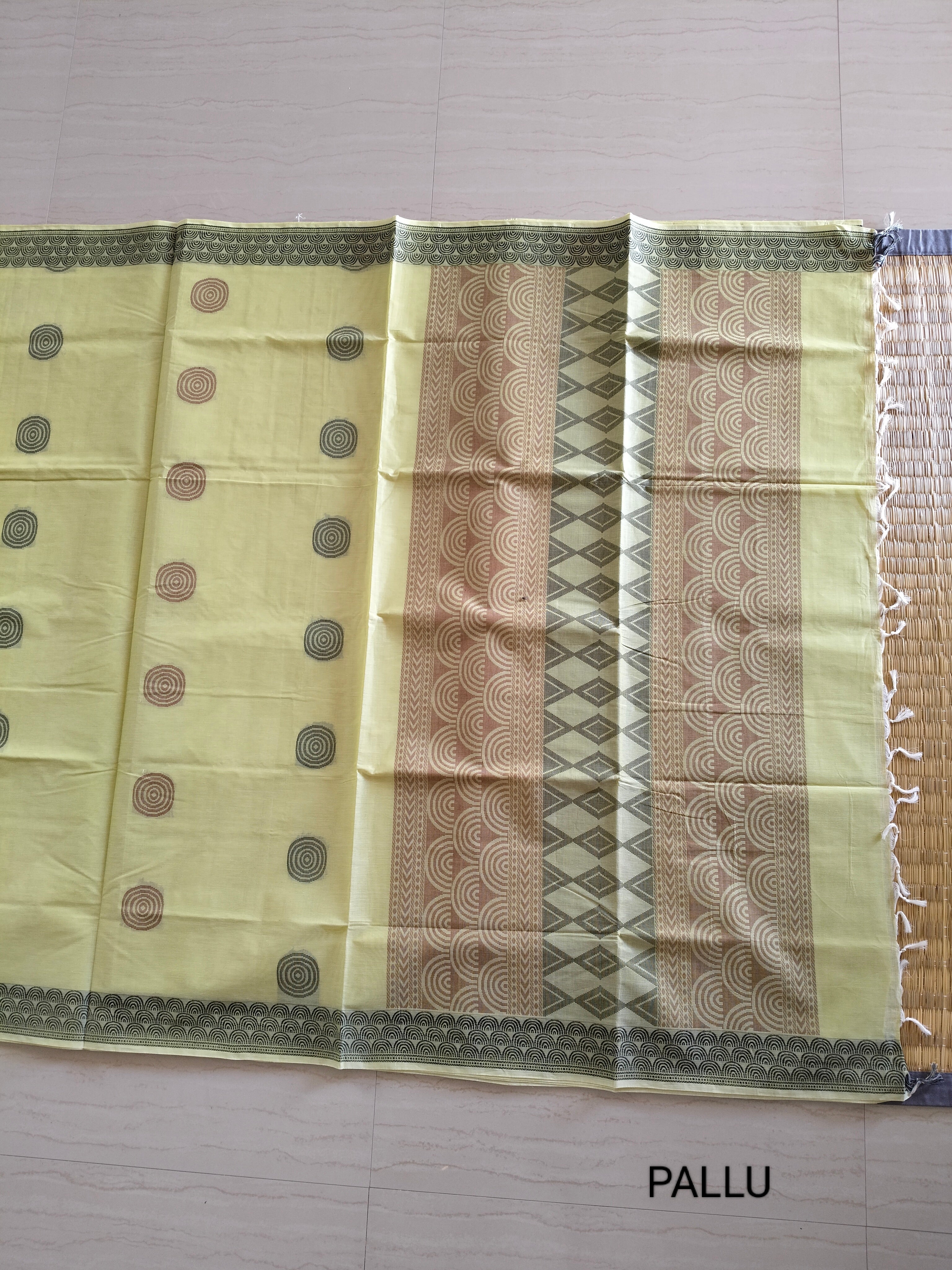 Lime cream cotton saree with thread buttas