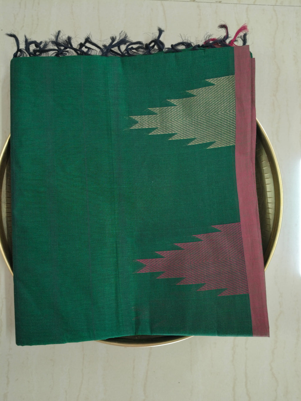 Dark green cotton saree with temple border