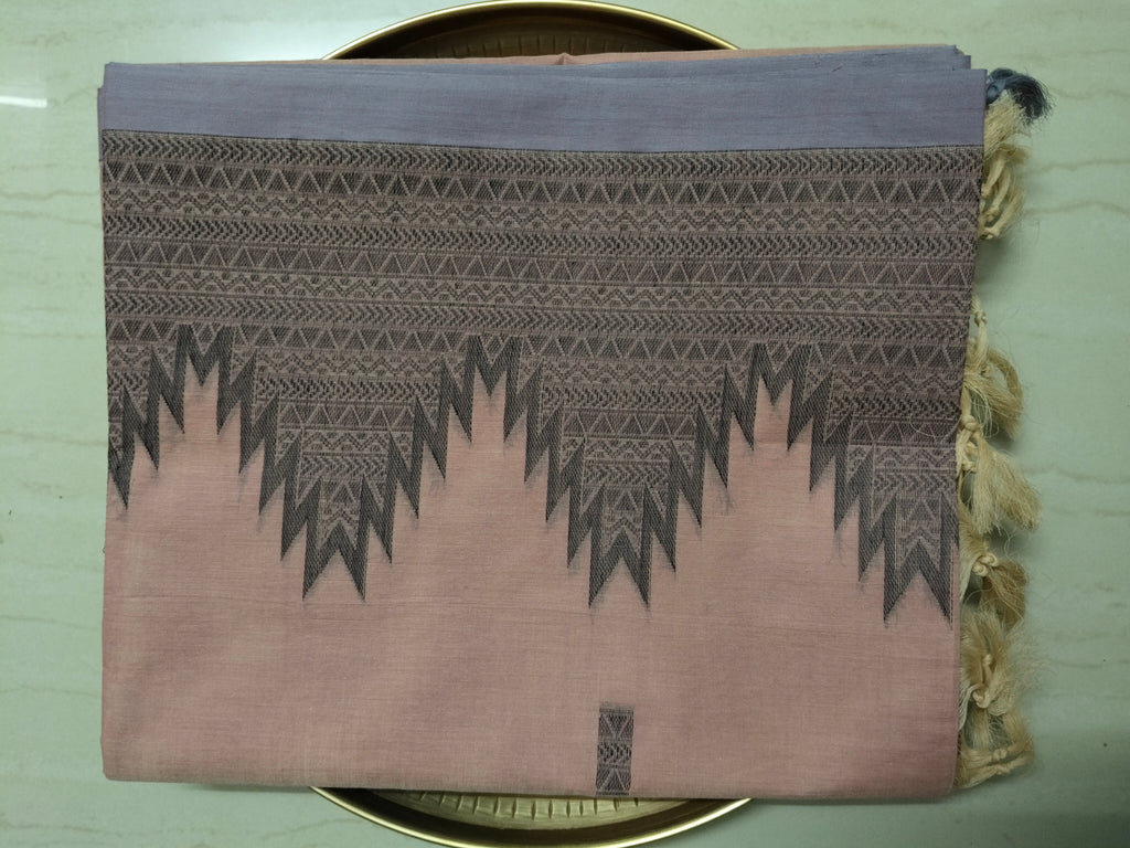 Pastel pink cotton saree with black buttas & one side temple border