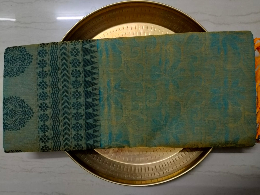 Green embossed cotton saree
