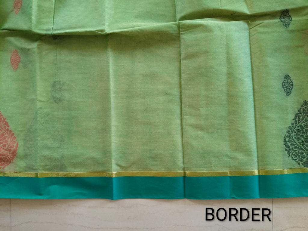 Light green dual tone cotton saree with thread buttas