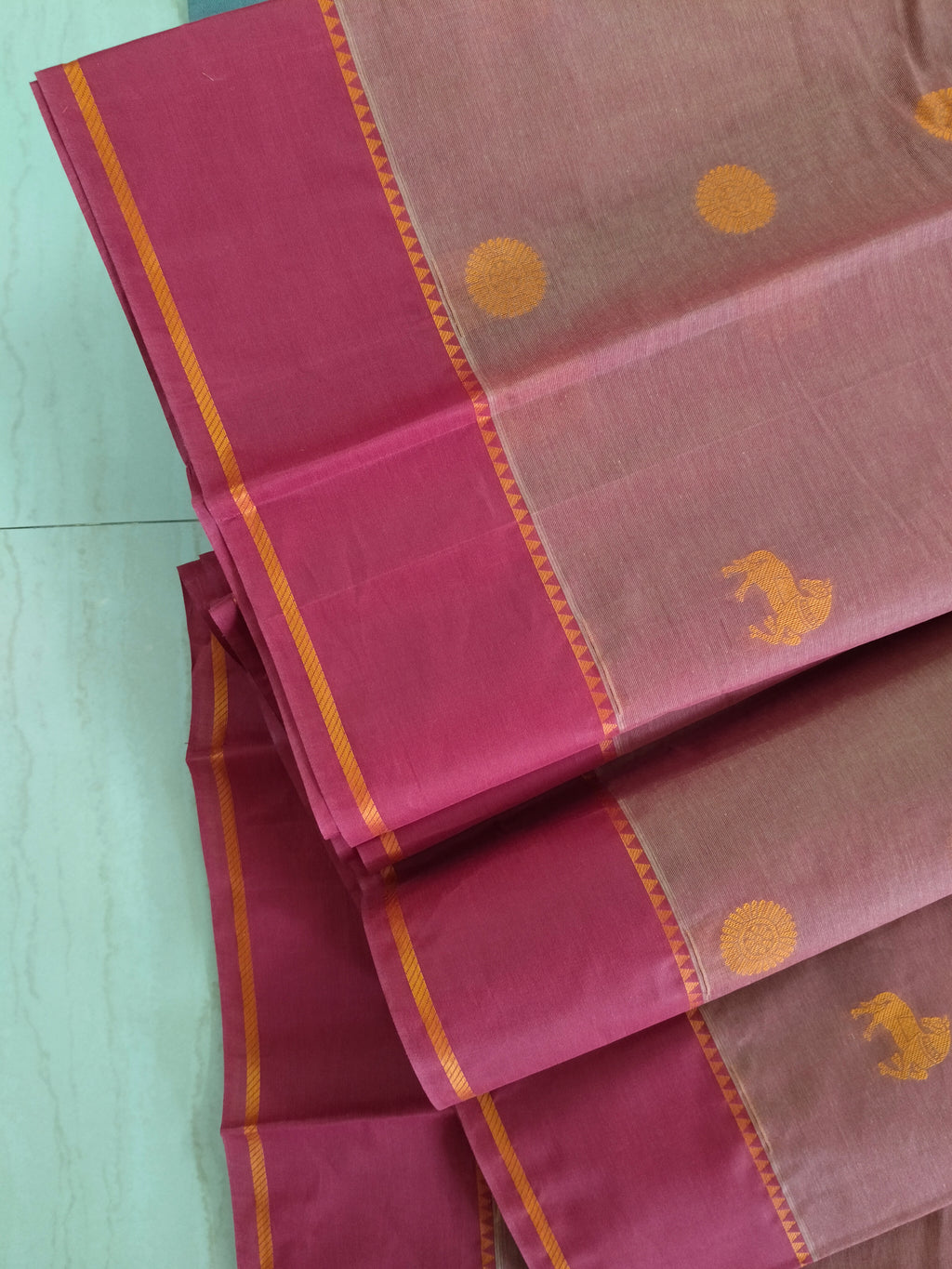 Deep Salmon cotton saree with horse & rudhrasham and ganga jamuna border