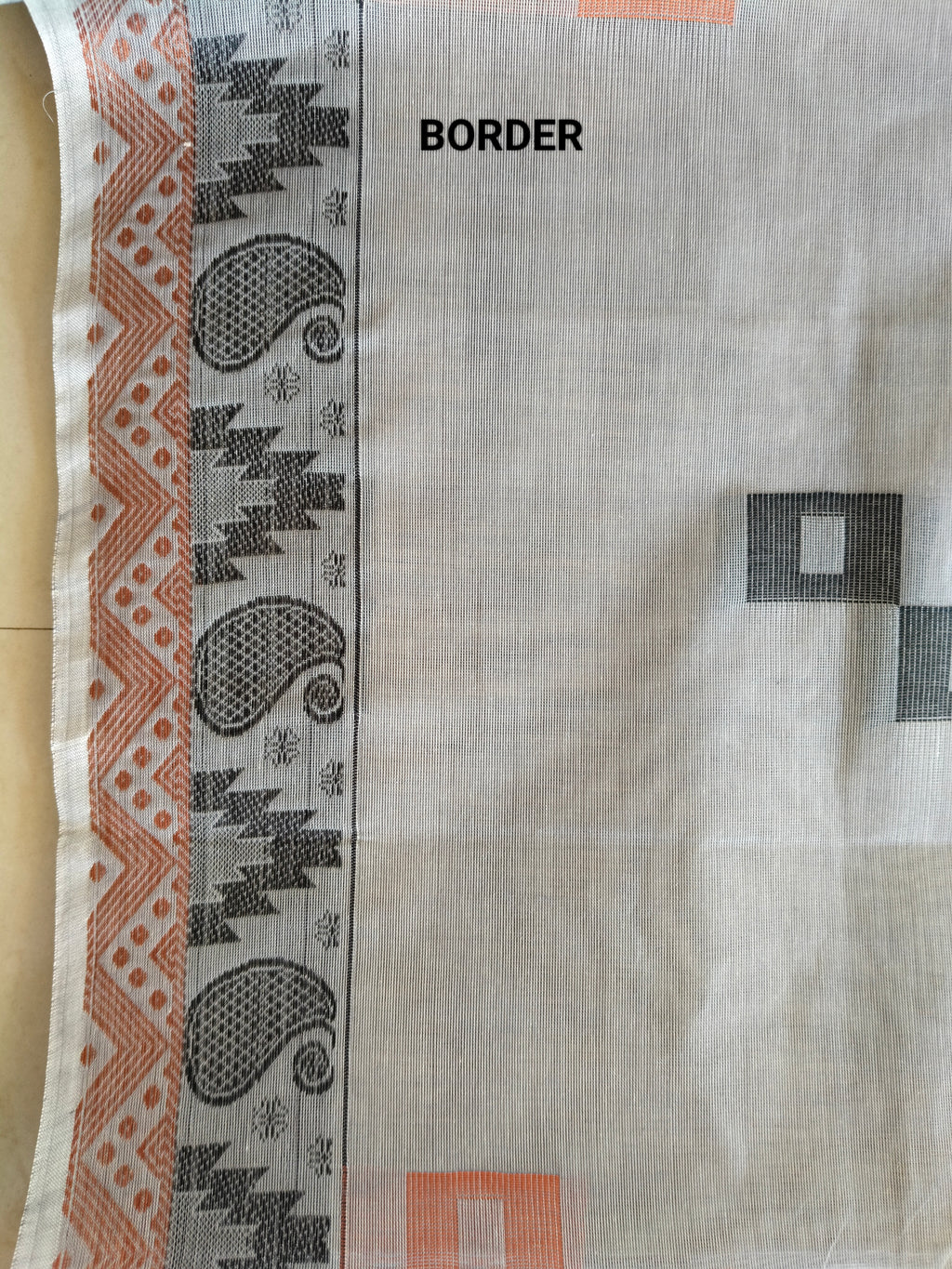 Grey cotton saree with square buttas