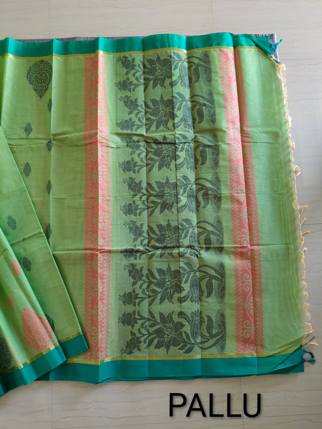 Light green dual tone cotton saree with thread buttas