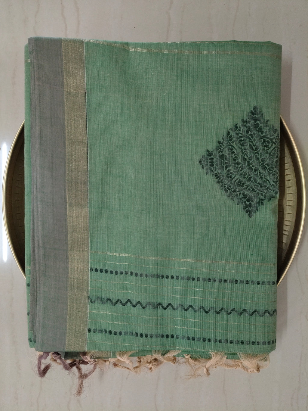 Green cotton saree with golden zari vertical lines & buttas