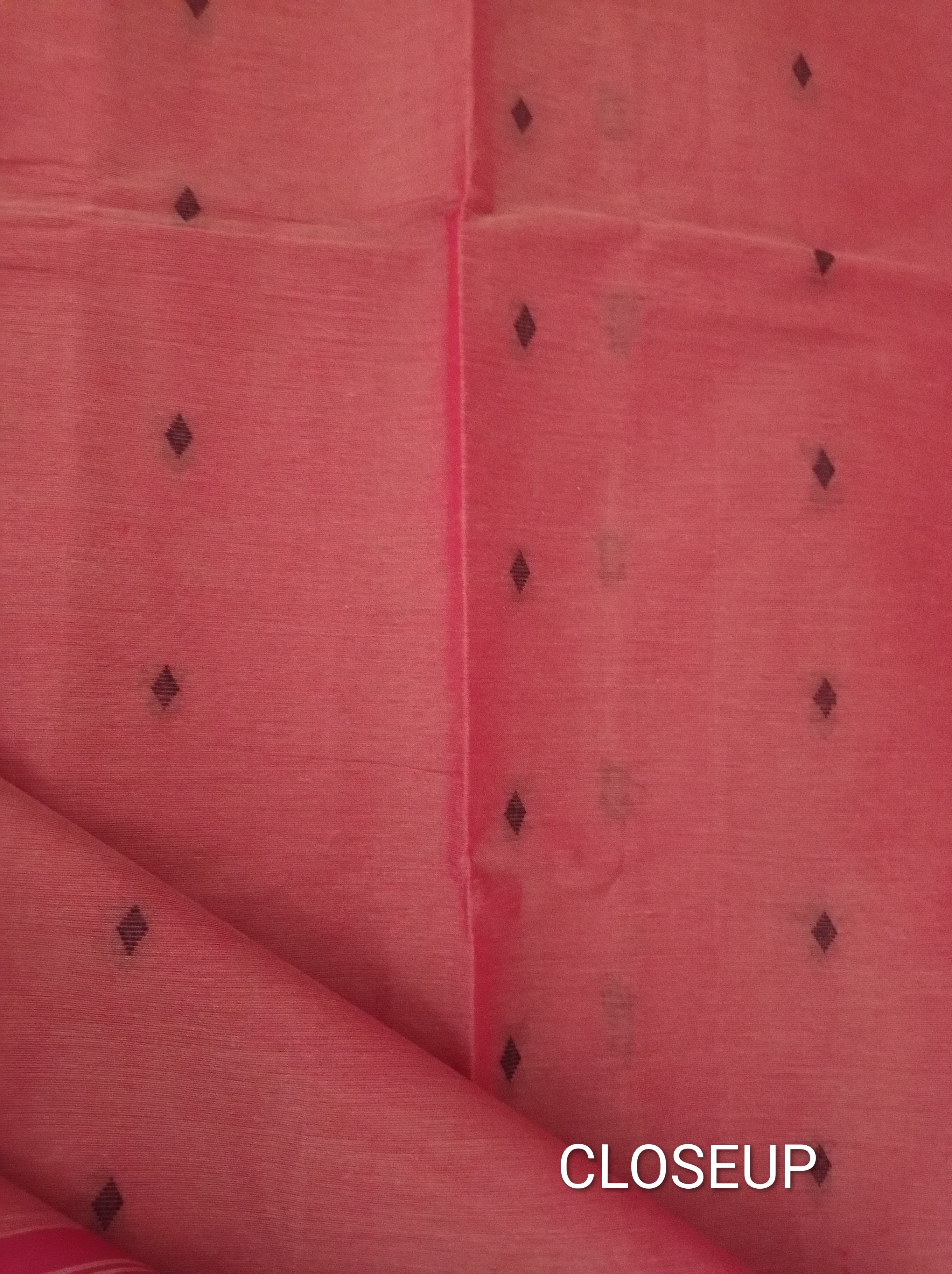Tart orange cotton saree with beige pallu