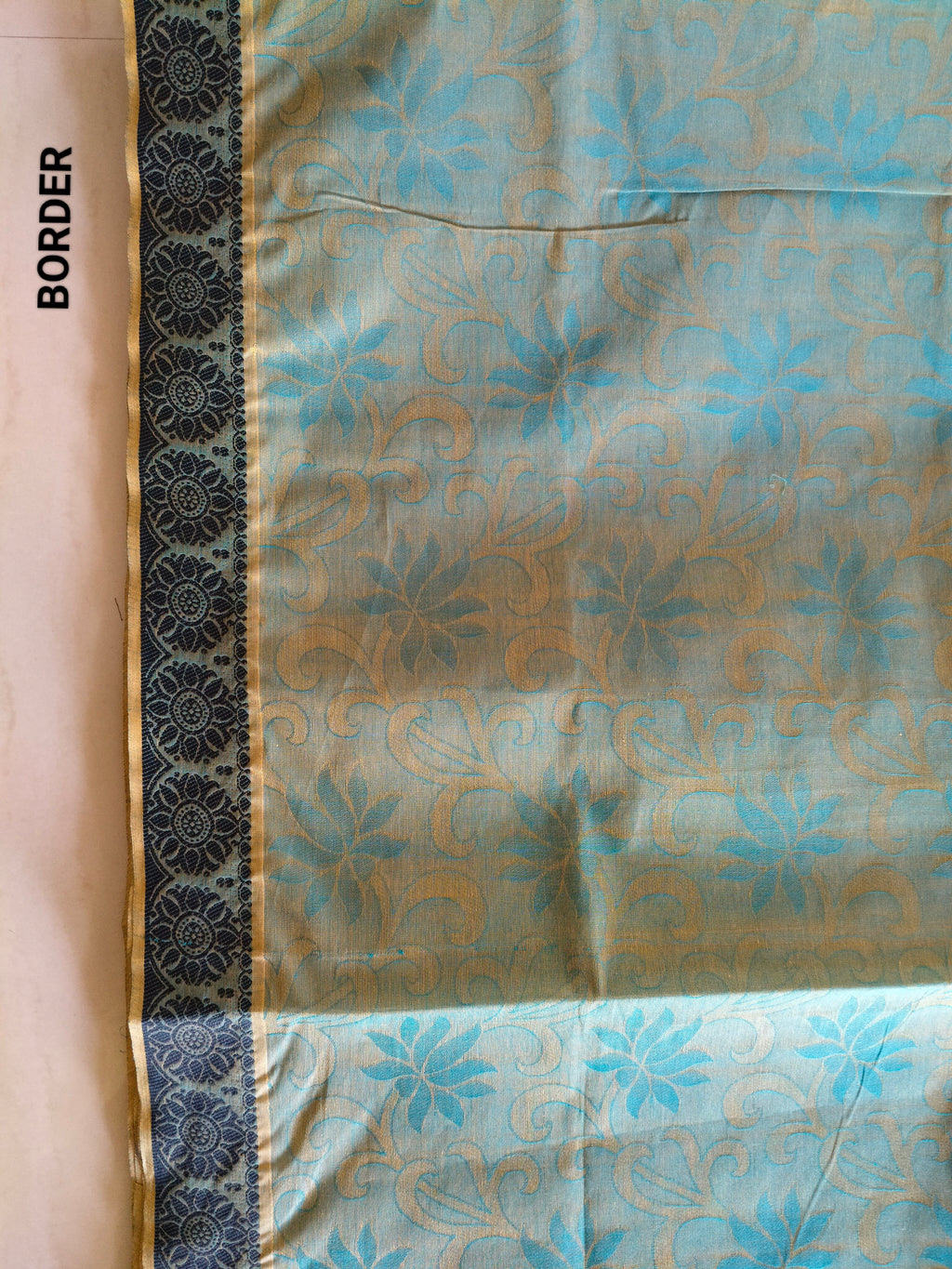 Green embossed cotton saree